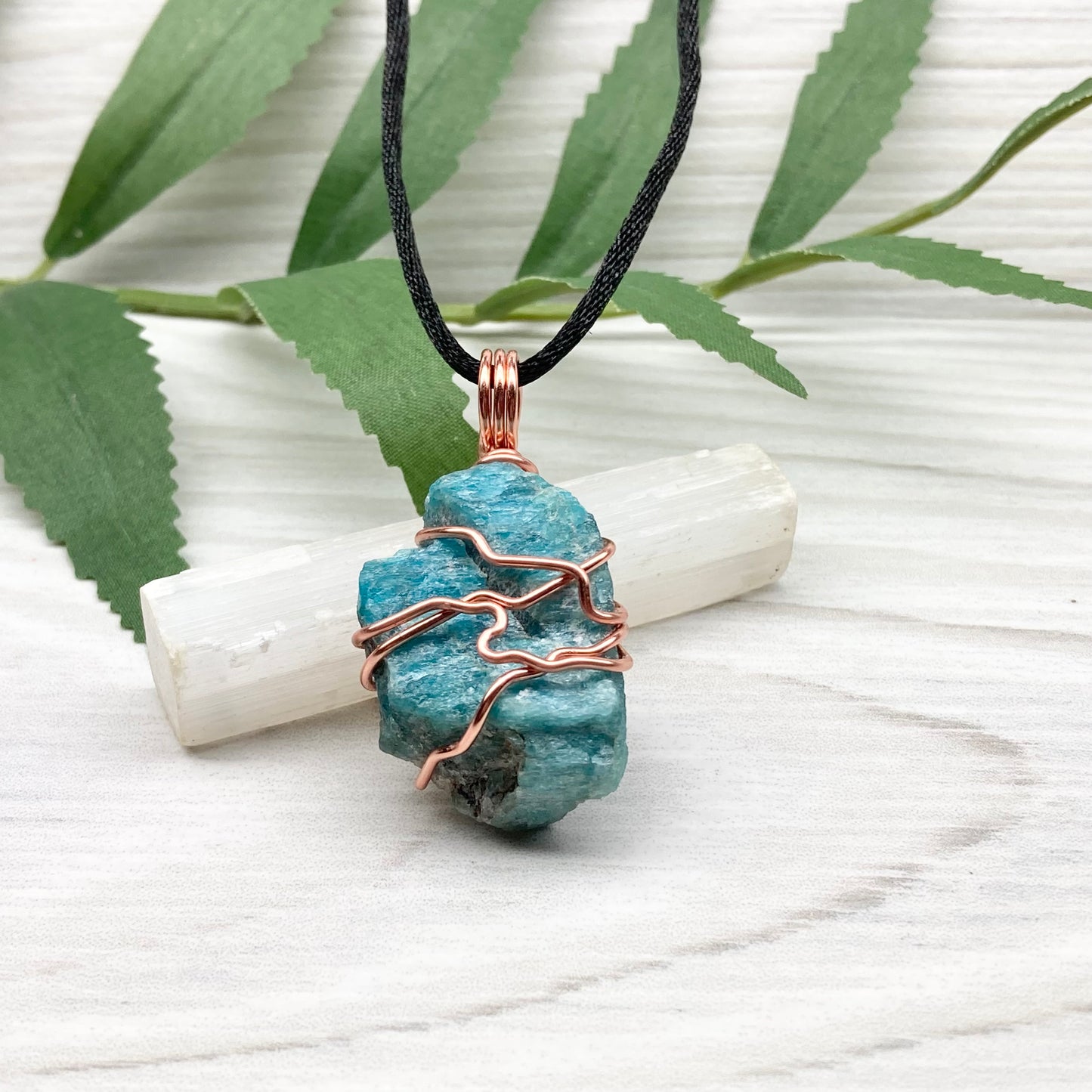 Blue Apatite Necklace. Raw Blue Apatite Stone Wrapped With Tarnish Resistant Copper Wire. This Pendant Was Handcrafted During The Moon In Scorpio. Comes On A Black Chain. Spiritual Jewelry For Him Or Her.