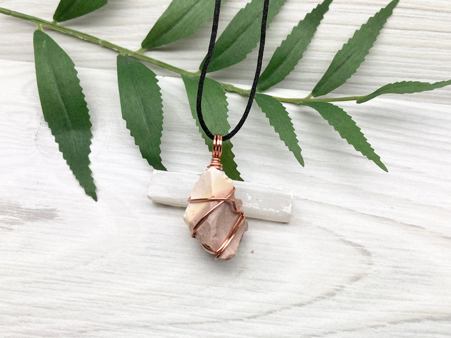 Raw Mookaite Jasper Necklace. Cream and Light Brown Crystal Wrapped With Tarnish Resistant Copper Wire. Comes On A Black Satin Silk Chain. Handcrafted During The Moon In Aries.