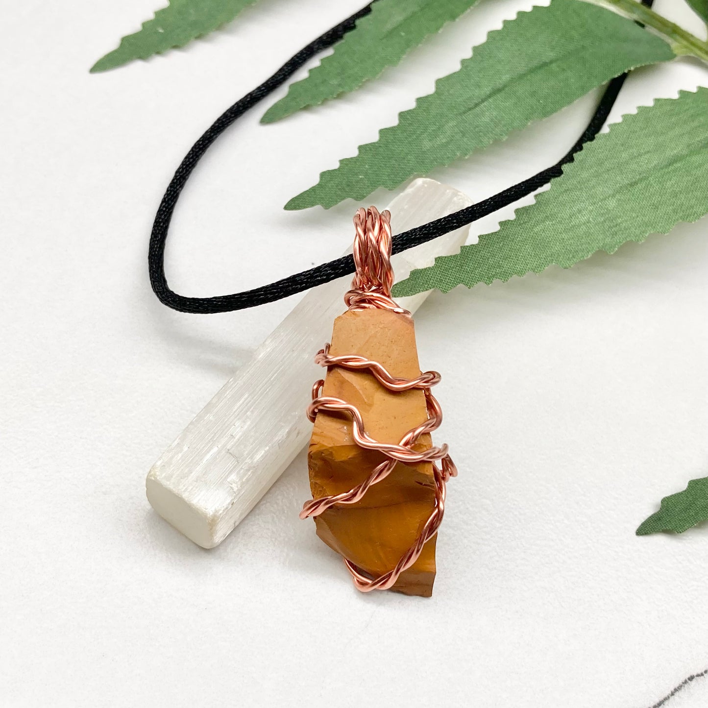 Natural Mookaite Jasper Necklace. Yellow Colored Raw Mookaite Crystal Wrapped With Pure Copper Wire. Comes On A Black Chain. Handmade Spiritual Gemstone Jewelry. Made In The USA.