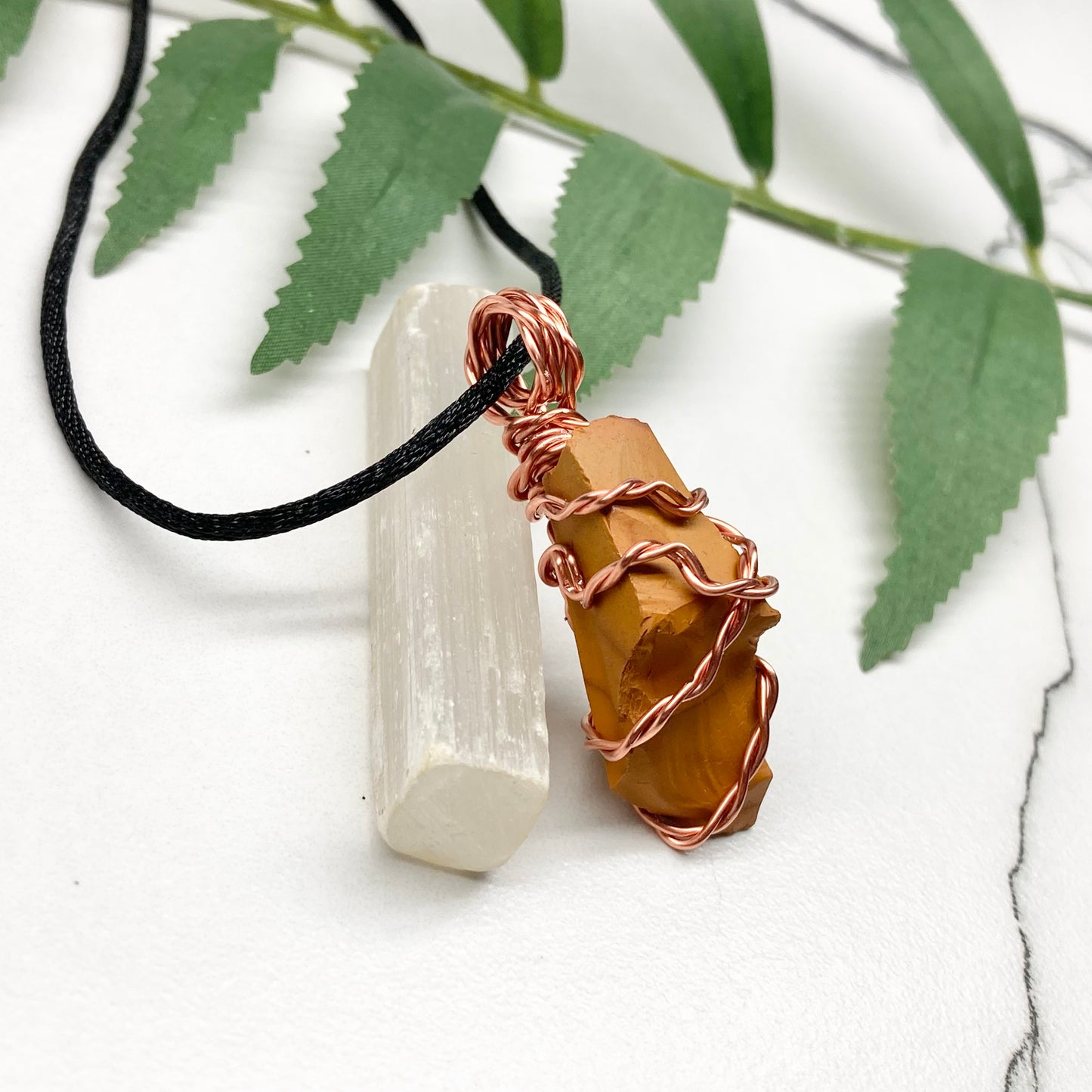 Natural Mookaite Jasper Necklace. Yellow Colored Raw Mookaite Crystal Wrapped With Pure Copper Wire. Comes On A Black Chain. Handmade Spiritual Gemstone Jewelry. Made In The USA.