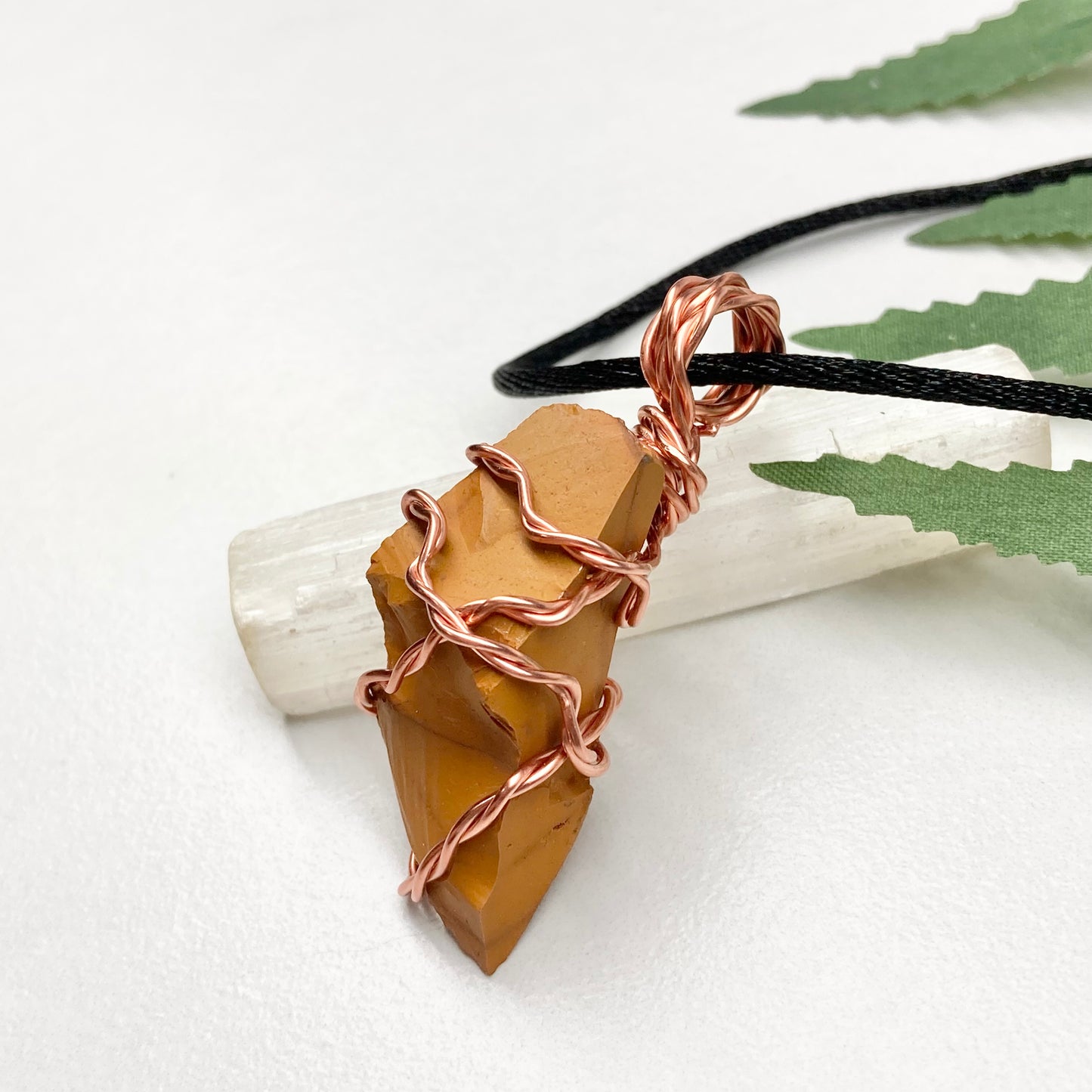 Natural Mookaite Jasper Necklace. Yellow Colored Raw Mookaite Crystal Wrapped With Pure Copper Wire. Comes On A Black Chain. Handmade Spiritual Gemstone Jewelry. Made In The USA.