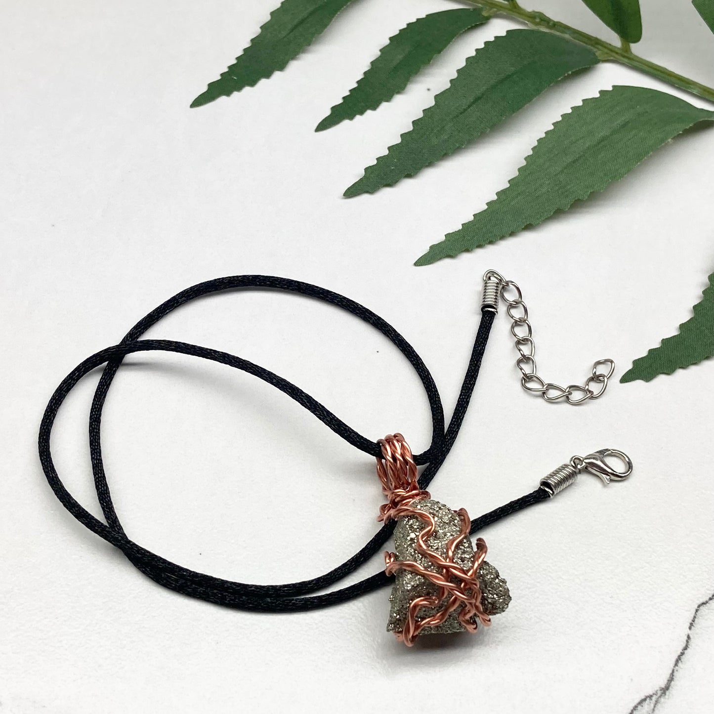 Raw Pyrite Necklace. Real Pyrite Stone Hand Wrapped With Copper Wire. Fools Gold Crystal Pendant. Comes On A Black Chain. Leo And Taurus Zodiac Jewelry. Handmade In Tennessee.