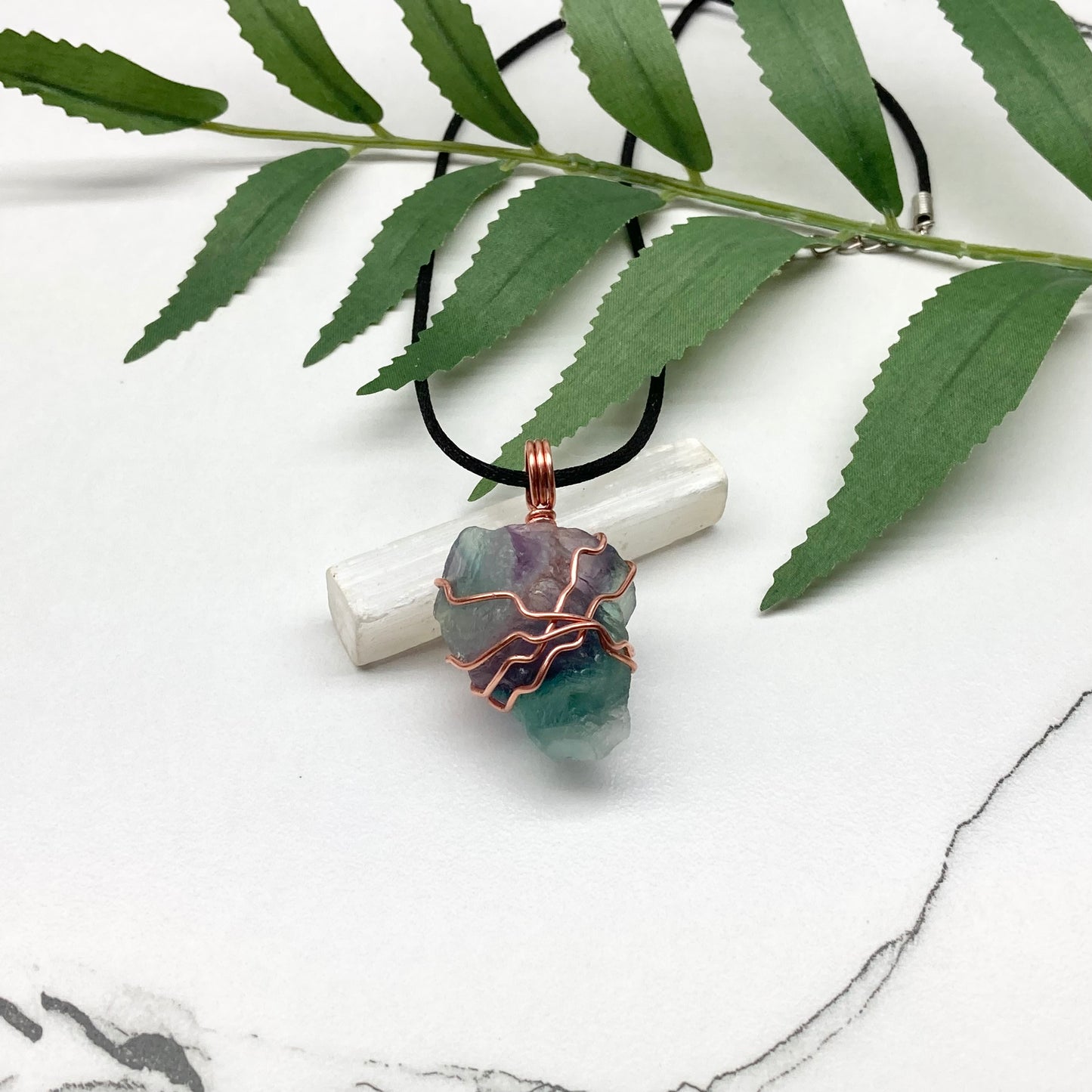 Rainbow Fluorite necklace. Green and purple Fluorite crystal wrapped with pure copper wire. Comes on a black chain. Wire wrapped stone pendant. Aquarius zodiac gift.