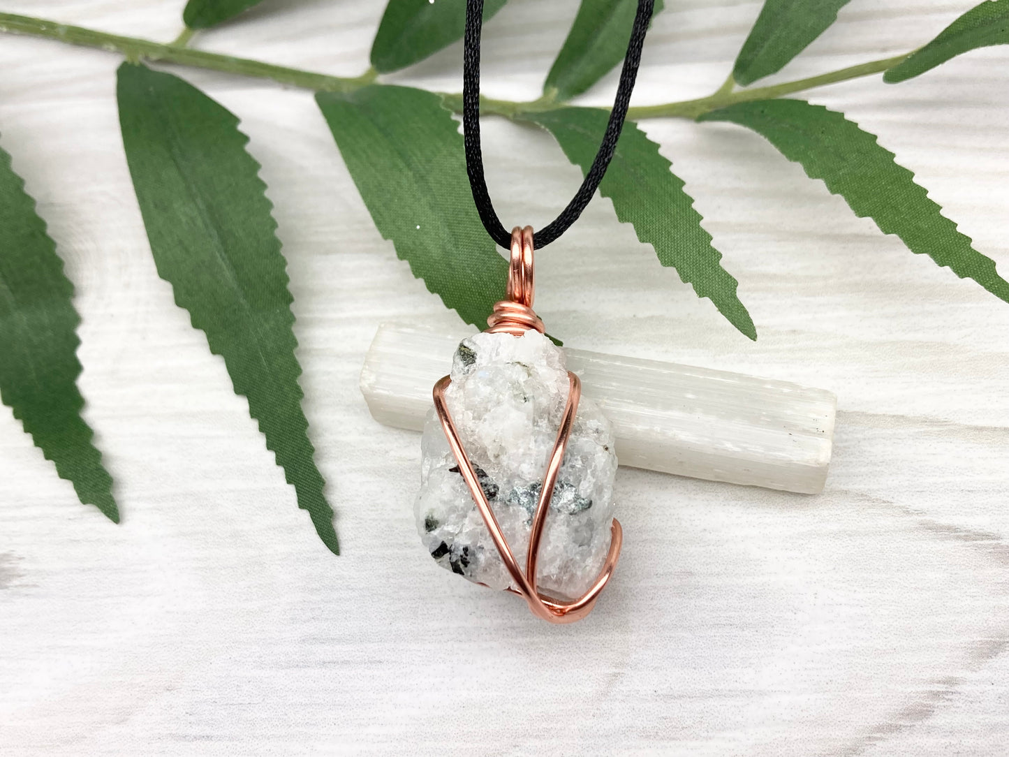 Rainbow Moonstone Necklace. White And Black Crystal Wrapped With Copper Wire. Comes On A Black Chain. This Stone Is Associated With The Third Eye Chakra.