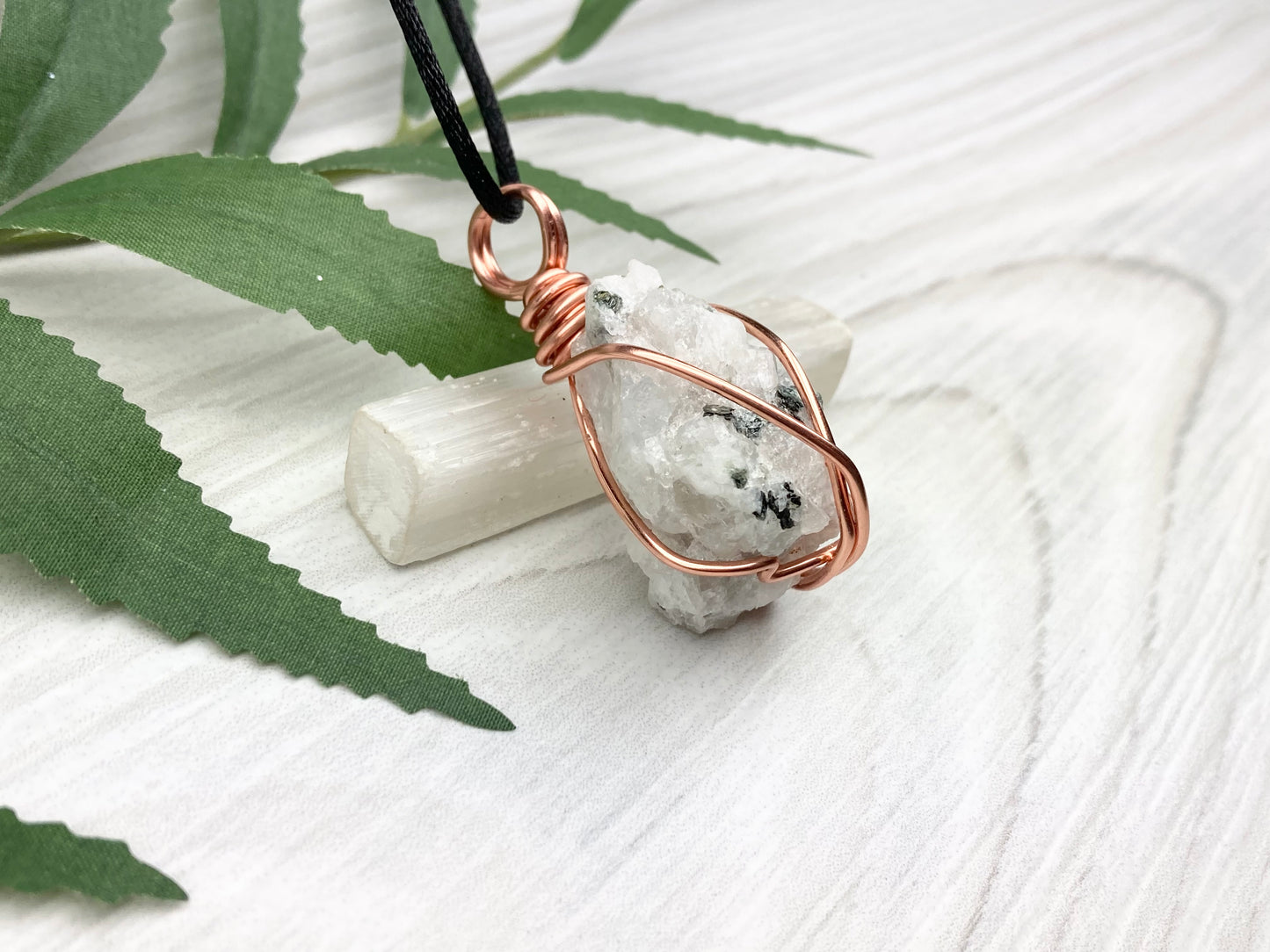 Rainbow Moonstone Necklace. White And Black Crystal Wrapped With Copper Wire. Comes On A Black Chain. This Stone Is Associated With The Third Eye Chakra.