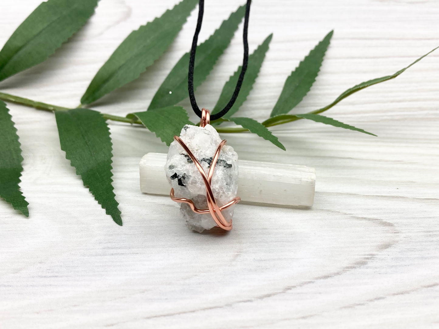 Rainbow Moonstone Necklace. White And Black Crystal Wrapped With Copper Wire. Comes On A Black Chain. This Stone Is Associated With The Third Eye Chakra.