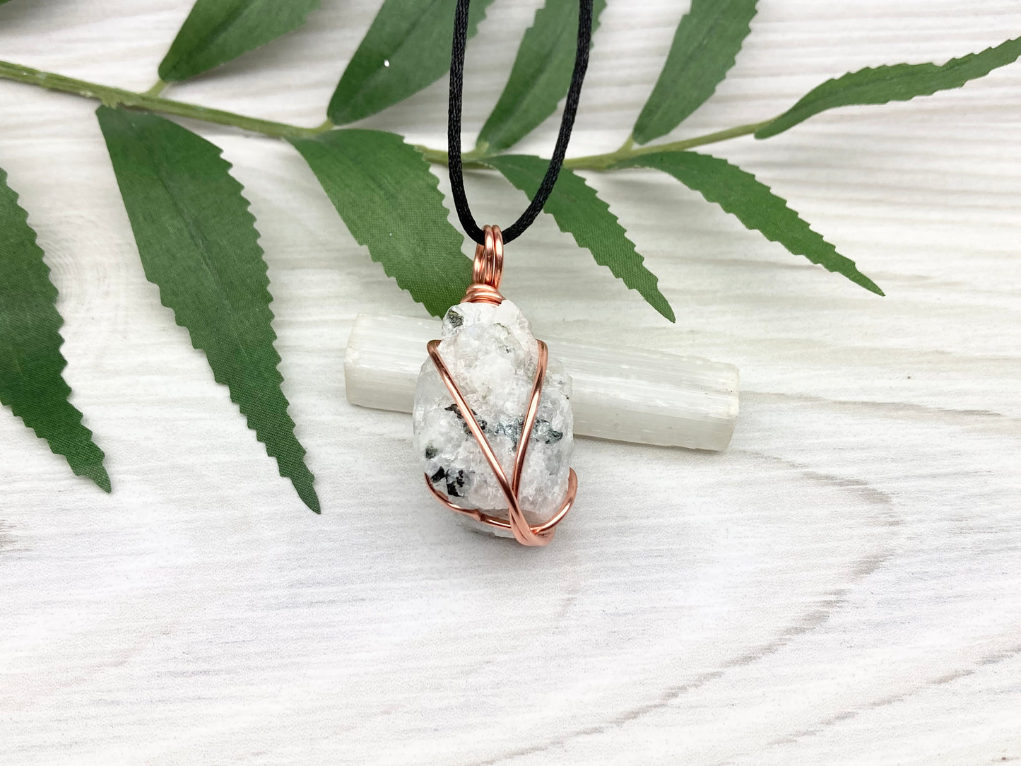 Rainbow Moonstone Necklace. White And Black Crystal Wrapped With Copper Wire. Comes On A Black Chain. This Stone Is Associated With The Third Eye Chakra.