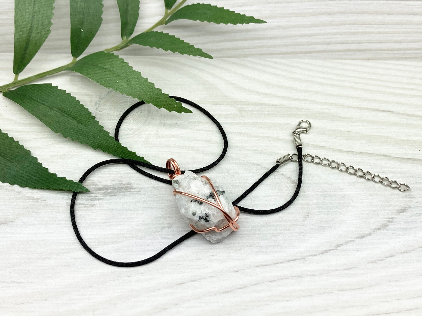 Rainbow Moonstone Necklace. White And Black Crystal Wrapped With Copper Wire. Comes On A Black Chain. This Stone Is Associated With The Third Eye Chakra.