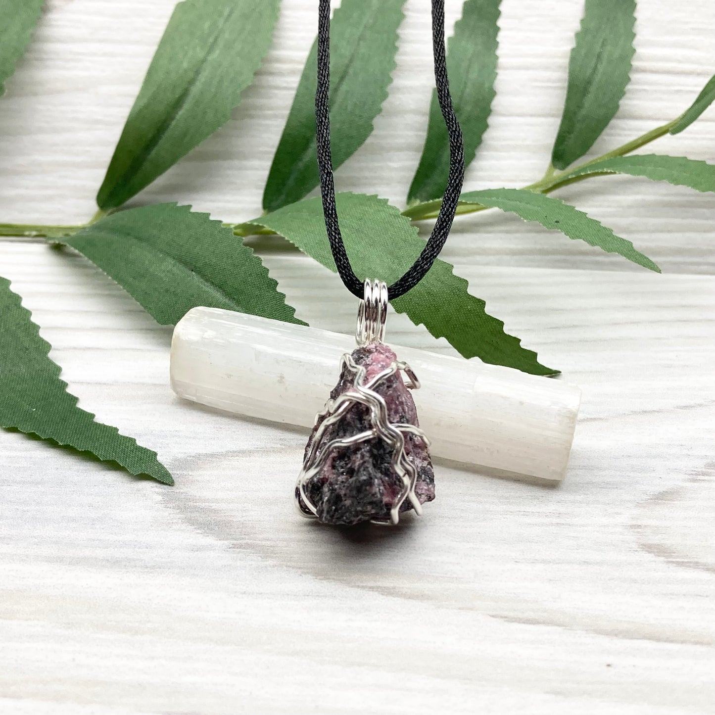 Rhodonite necklace. Raw Rhodonite wrapped with silver copper wire. Comes on a black chain. Black and pink crystal pendant. Wire wrapped stone jewelry. Taurus zodiac gift.