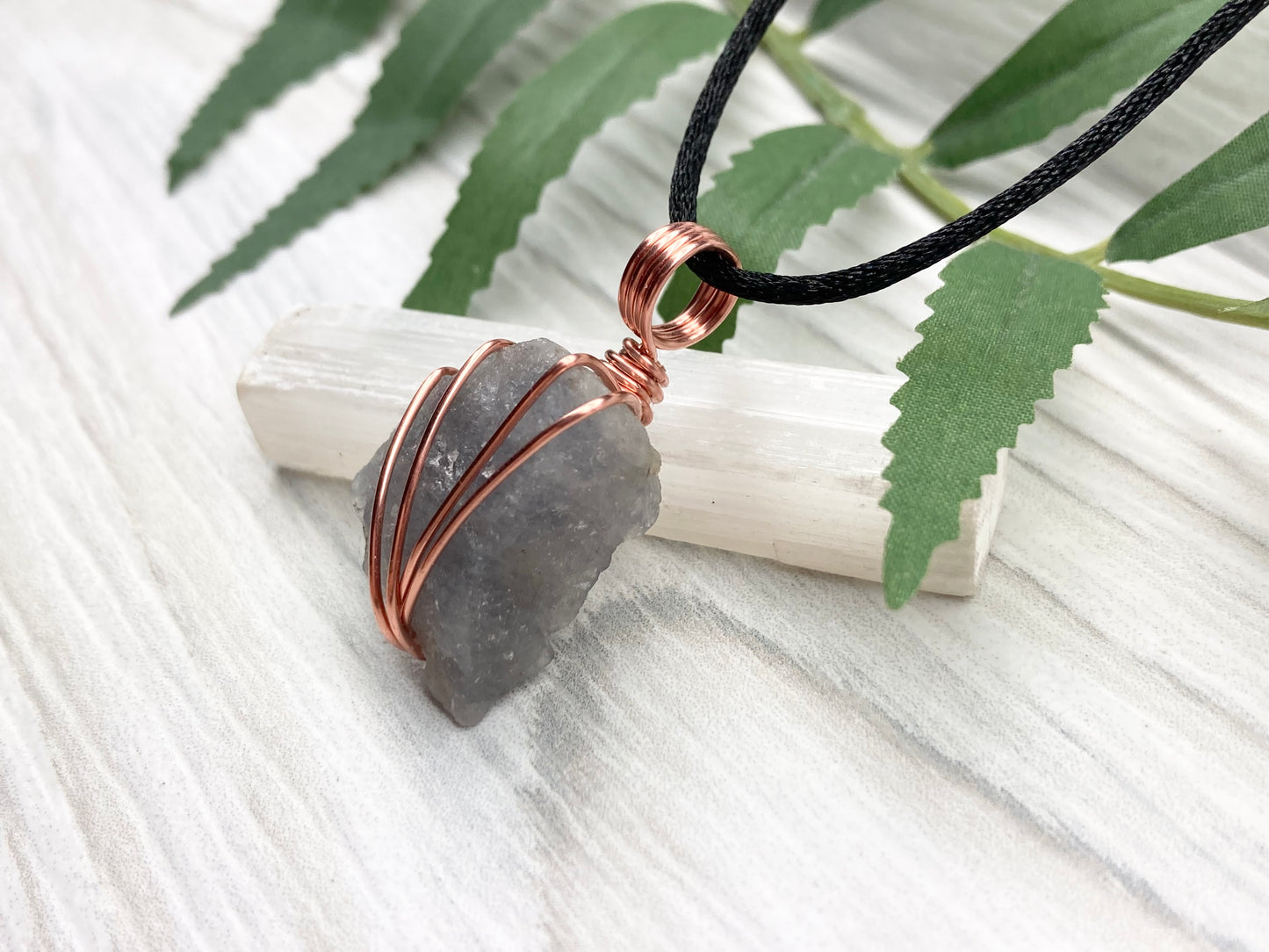 Raw Iolite Necklace. Natural Iolite Crystal Wrapped With Pure Copper Wire.This Stone Is A Blue Purple Color. Comes On A Black Chain. New Age Sagittarius Pendant.