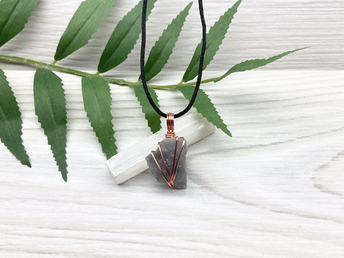 Raw Iolite Necklace. Natural Iolite Crystal Wrapped With Pure Copper Wire.This Stone Is A Blue Purple Color. Comes On A Black Chain. New Age Sagittarius Pendant.