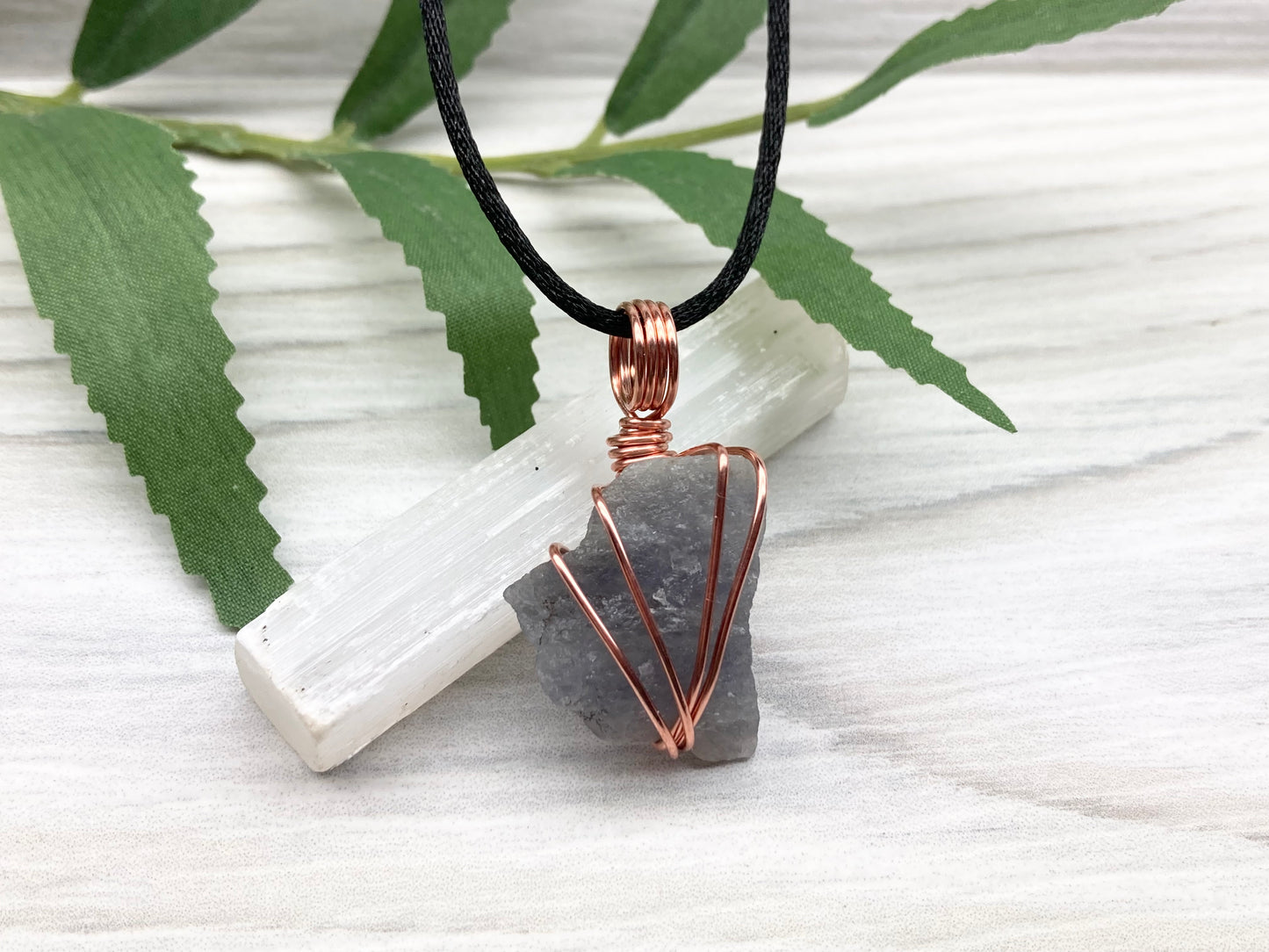 Raw Iolite Necklace. Natural Iolite Crystal Wrapped With Pure Copper Wire.This Stone Is A Blue Purple Color. Comes On A Black Chain. New Age Sagittarius Pendant.
