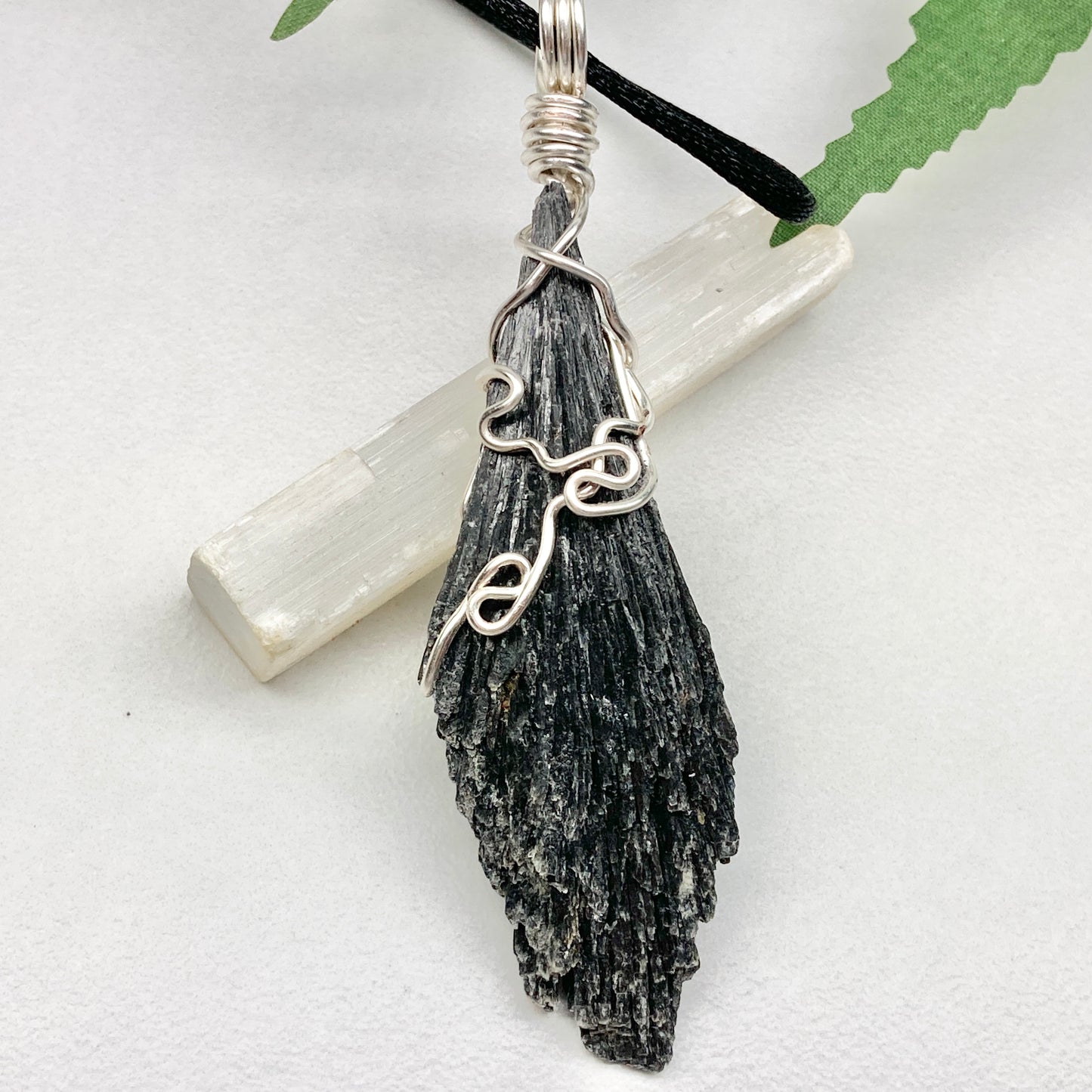 Black Kyanite necklace. Raw natural Kyanite wrapped with silver copper wire. Kyanite broom pendant. Black crystal jewelry. Comes on a black chain. Witchy gift.