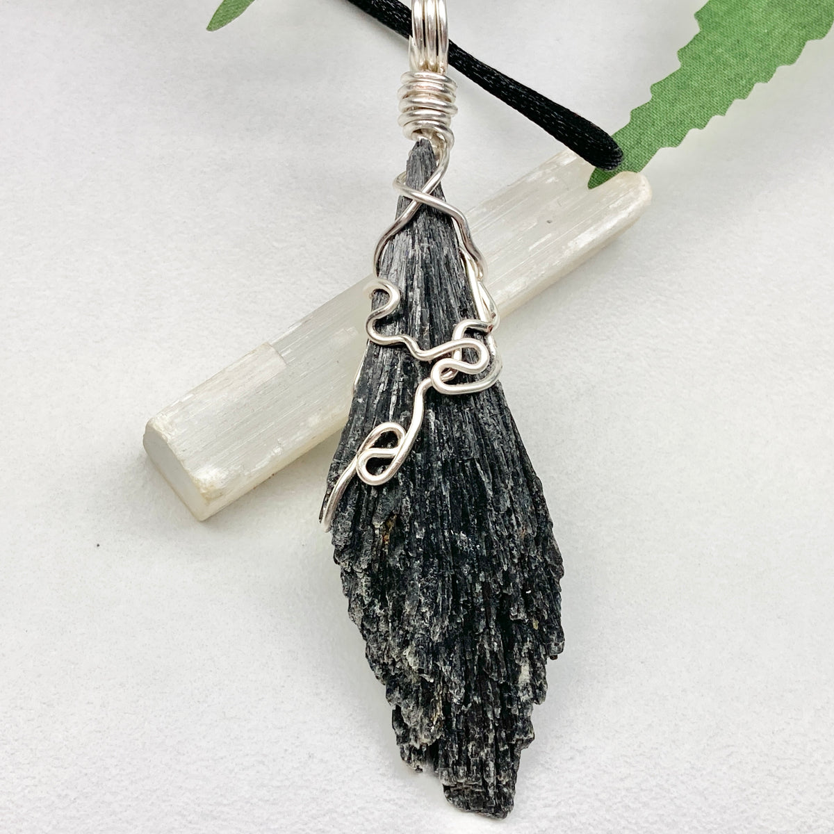 Black Kyanite necklace. Raw natural Kyanite wrapped with silver copper wire. Kyanite broom pendant. Black crystal jewelry. Comes on a black chain. Witchy gift.