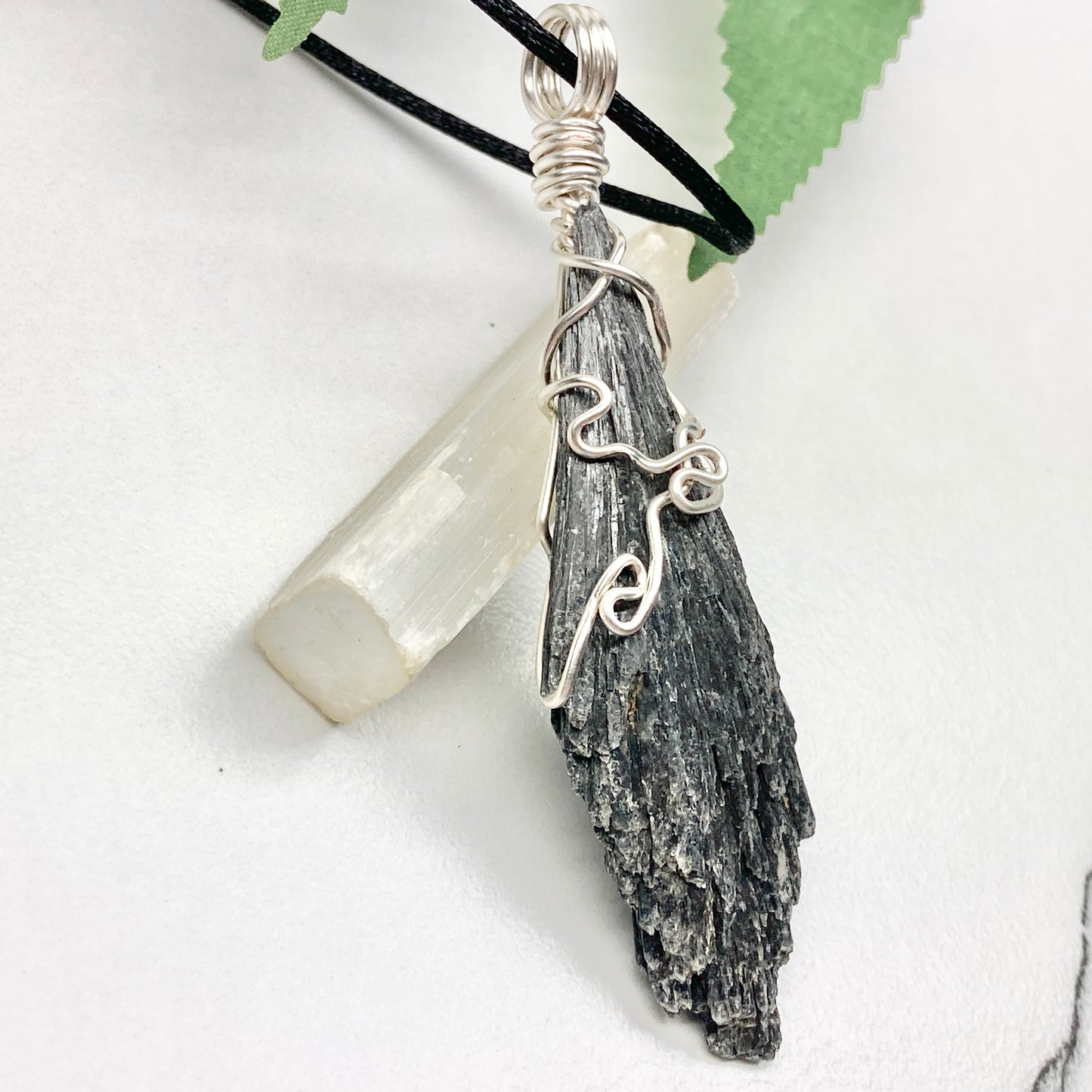 Black Kyanite necklace. Raw natural Kyanite wrapped with silver copper wire. Kyanite broom pendant. Black crystal jewelry. Comes on a black chain. Witchy gift.