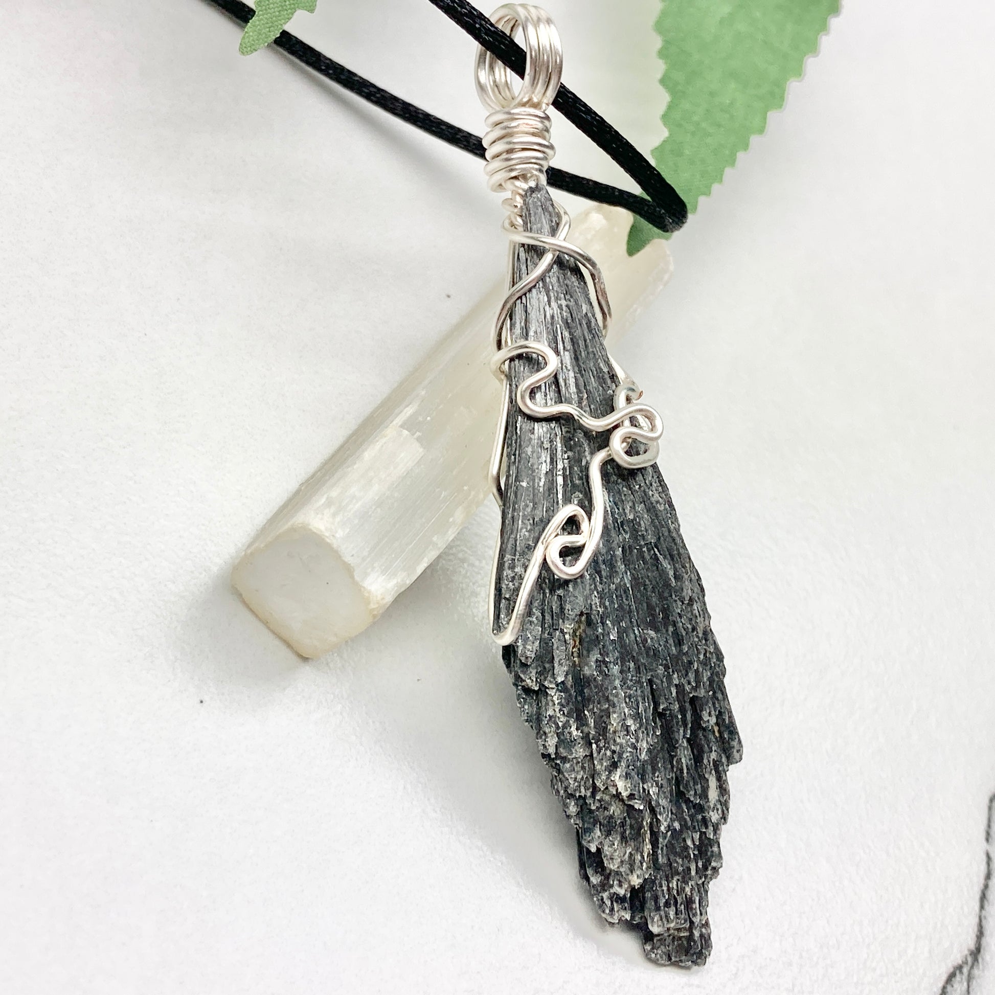 Black Kyanite necklace. Raw natural Kyanite wrapped with silver copper wire. Kyanite broom pendant. Black crystal jewelry. Comes on a black chain. Witchy gift.