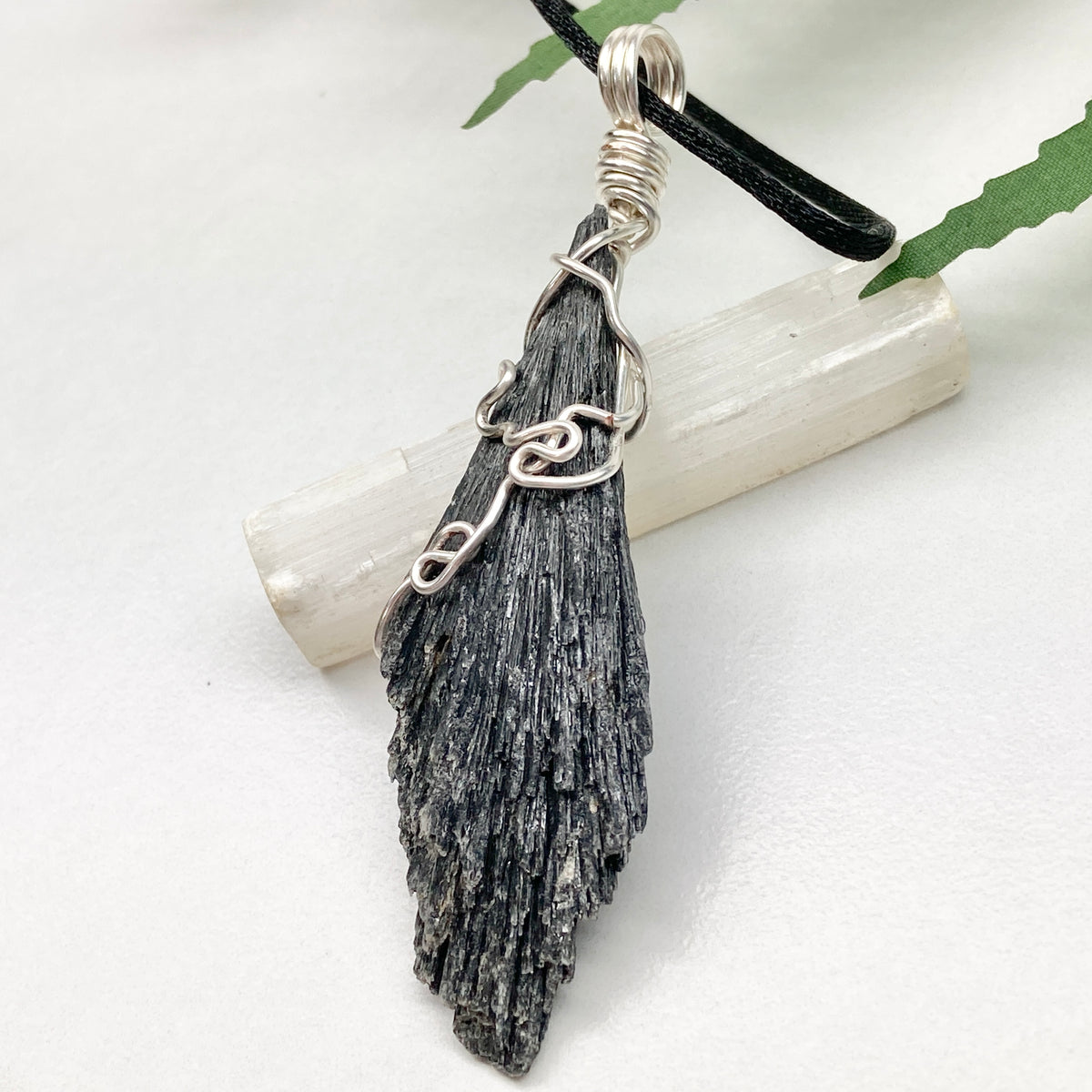 Black Kyanite necklace. Raw natural Kyanite wrapped with silver copper wire. Kyanite broom pendant. Black crystal jewelry. Comes on a black chain. Witchy gift.