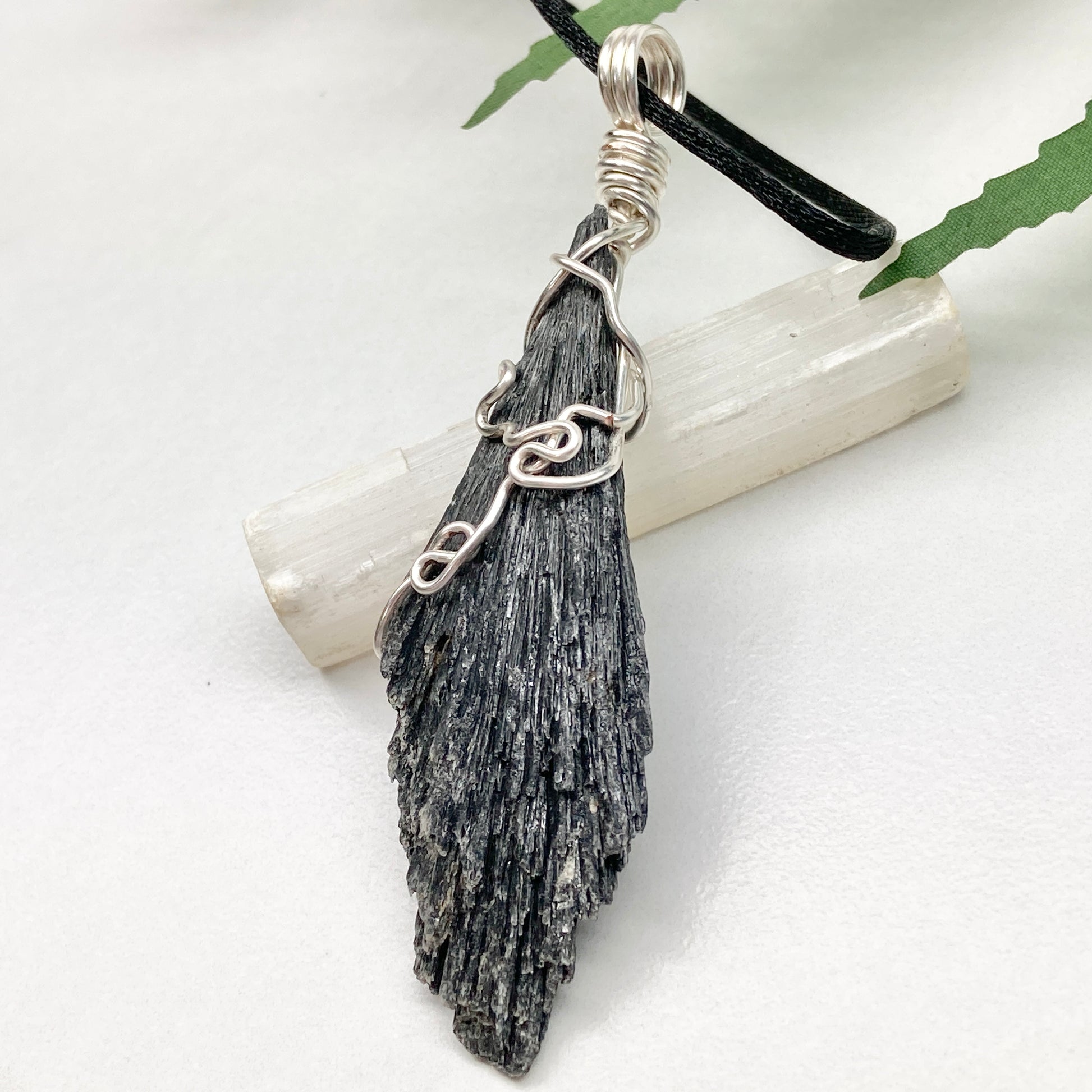 Black Kyanite necklace. Raw natural Kyanite wrapped with silver copper wire. Kyanite broom pendant. Black crystal jewelry. Comes on a black chain. Witchy gift.