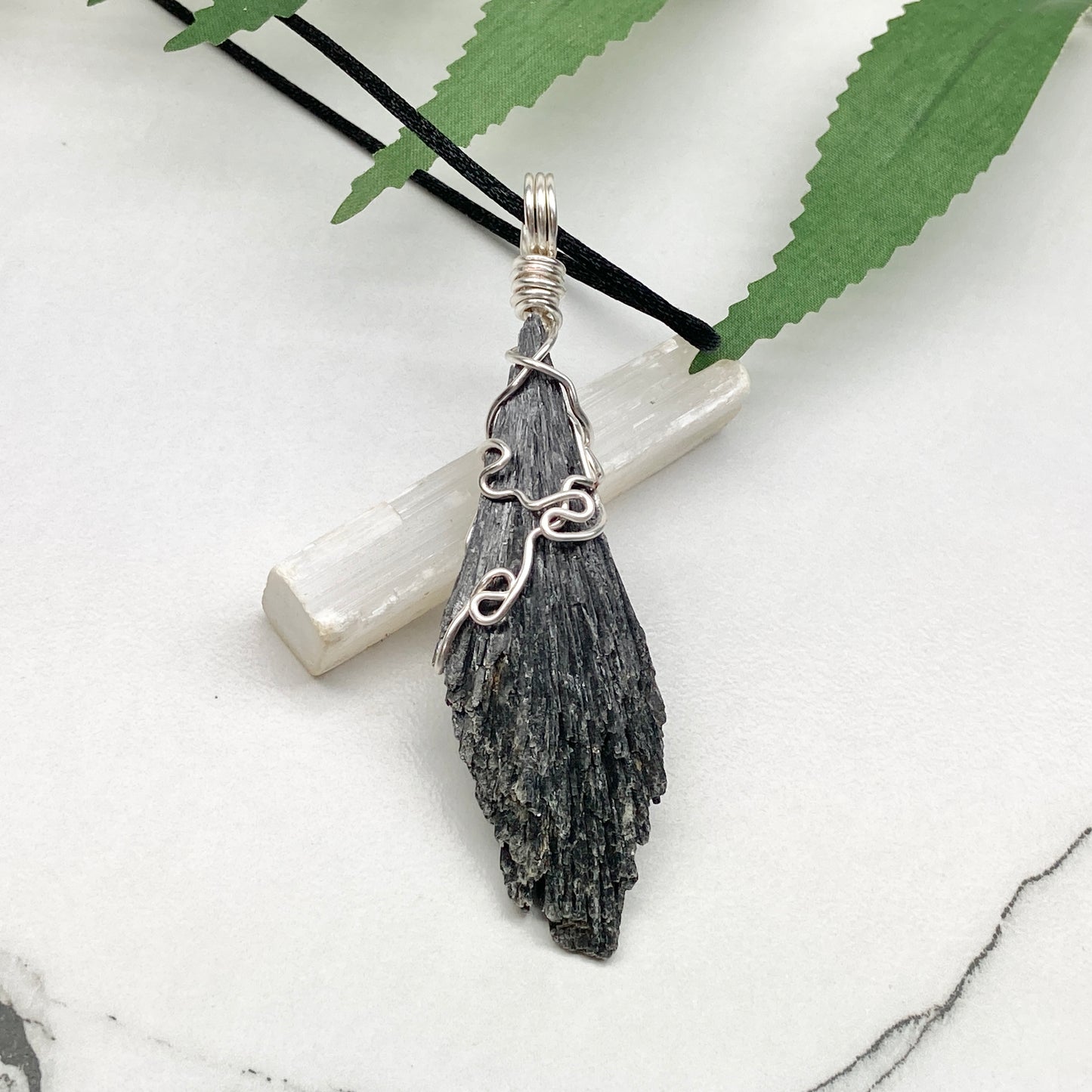 Black Kyanite necklace. Raw natural Kyanite wrapped with silver copper wire. Kyanite broom pendant. Black crystal jewelry. Comes on a black chain. Witchy gift.