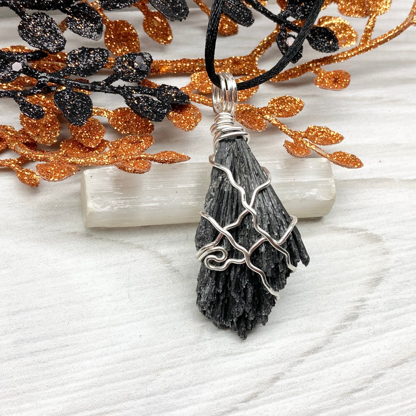 Black Kyanite necklace. Raw natural Kyanite wrapped with silver copper wire. Kyanite broom pendant. Black crystal jewelry. Comes on a black chain. Witchy gift.