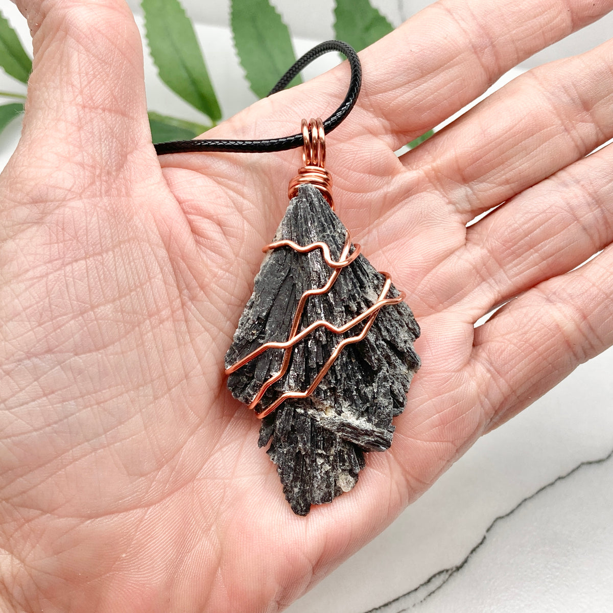 Black Kyanite necklace. Real raw Black Kyanite wrapped with 99.9% pure copper wire. Hangs on a black chain. Wire wrapped black crystal pendant. Spiritual gift.