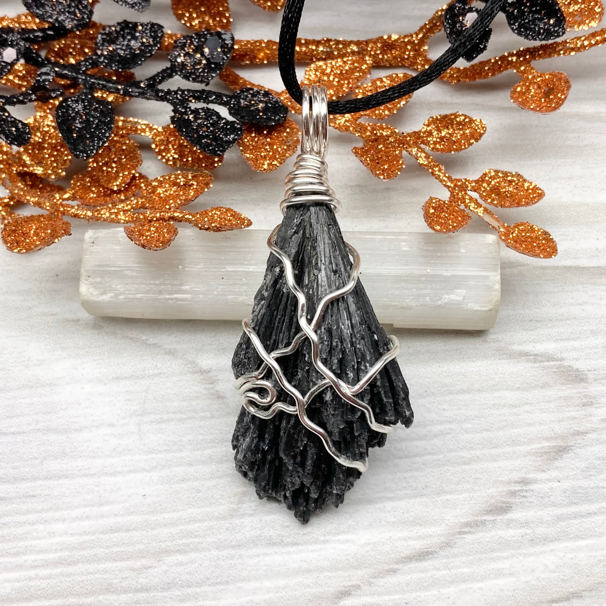 Black Kyanite necklace. Raw natural Kyanite wrapped with silver copper wire. Kyanite broom pendant. Black crystal jewelry. Comes on a black chain. Witchy gift.