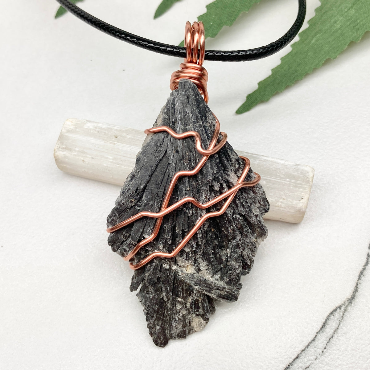 Black Kyanite necklace. Real raw Black Kyanite wrapped with 99.9% pure copper wire. Hangs on a black chain. Wire wrapped black crystal pendant. Spiritual gift.