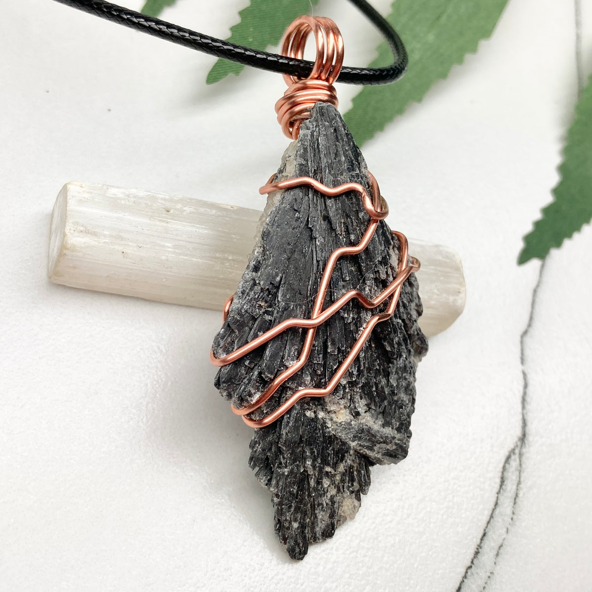 Black Kyanite necklace. Real raw Black Kyanite wrapped with 99.9% pure copper wire. Hangs on a black chain. Wire wrapped black crystal pendant. Spiritual gift.