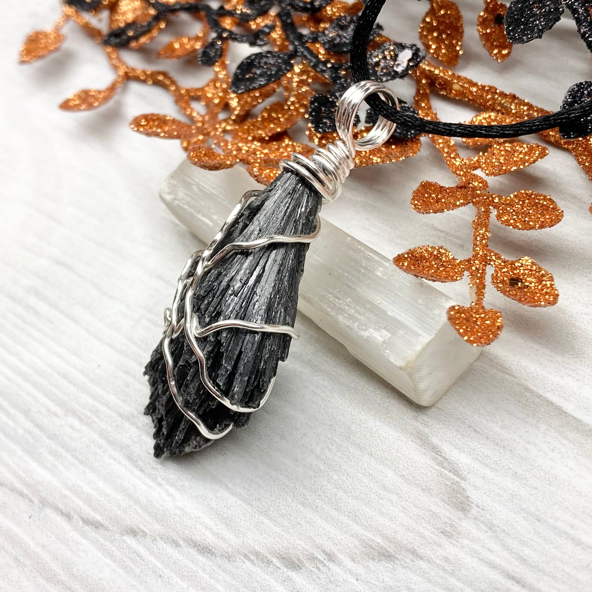 Black Kyanite necklace. Raw natural Kyanite wrapped with silver copper wire. Kyanite broom pendant. Black crystal jewelry. Comes on a black chain. Witchy gift.