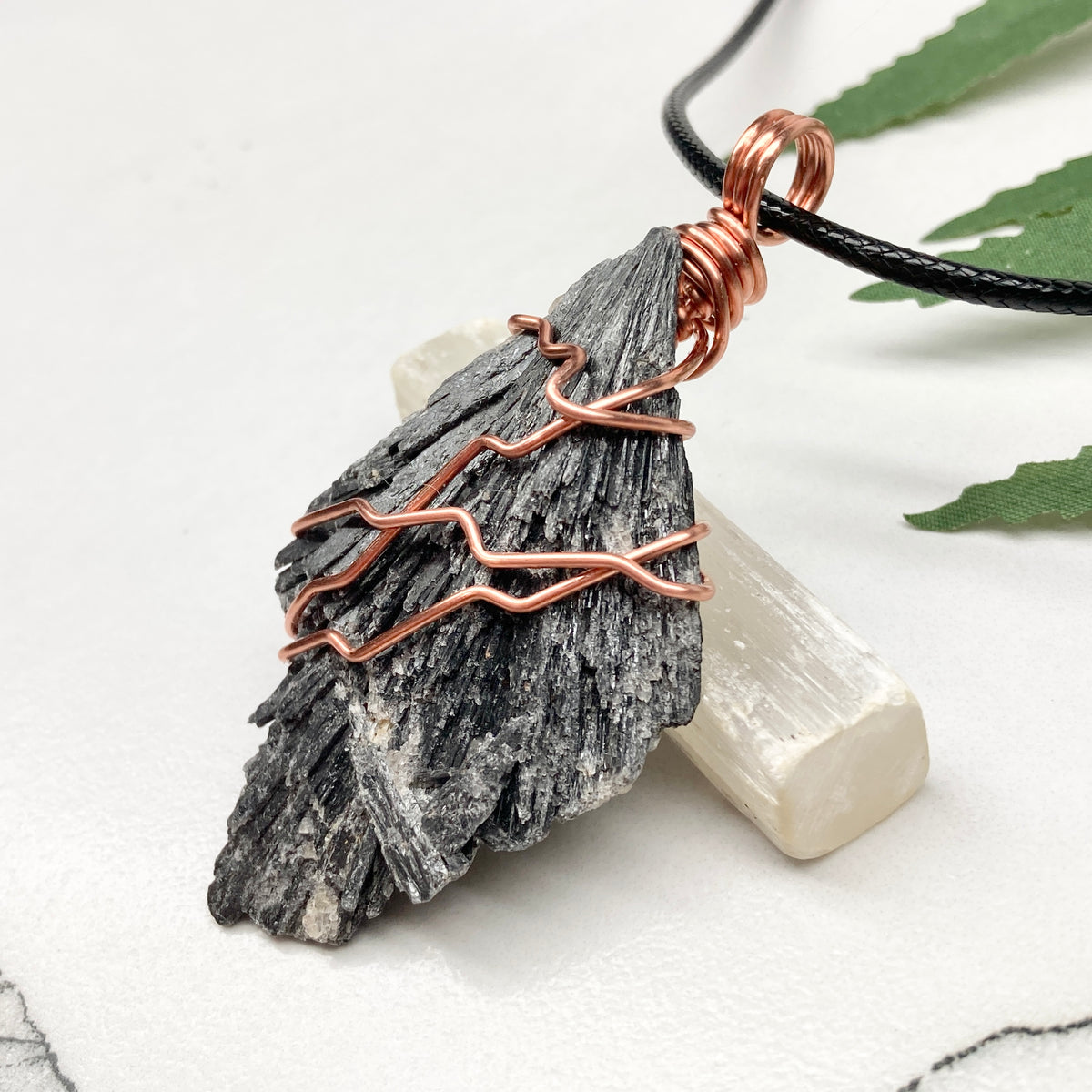 Black Kyanite necklace. Real raw Black Kyanite wrapped with 99.9% pure copper wire. Hangs on a black chain. Wire wrapped black crystal pendant. Spiritual gift.