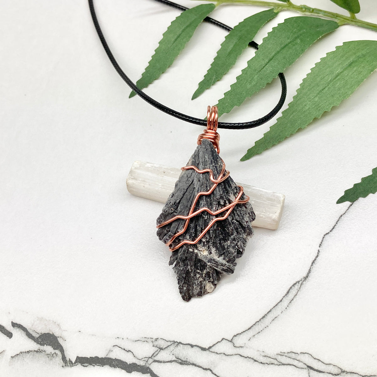 Black Kyanite necklace. Real raw Black Kyanite wrapped with 99.9% pure copper wire. Hangs on a black chain. Wire wrapped black crystal pendant. Spiritual gift.