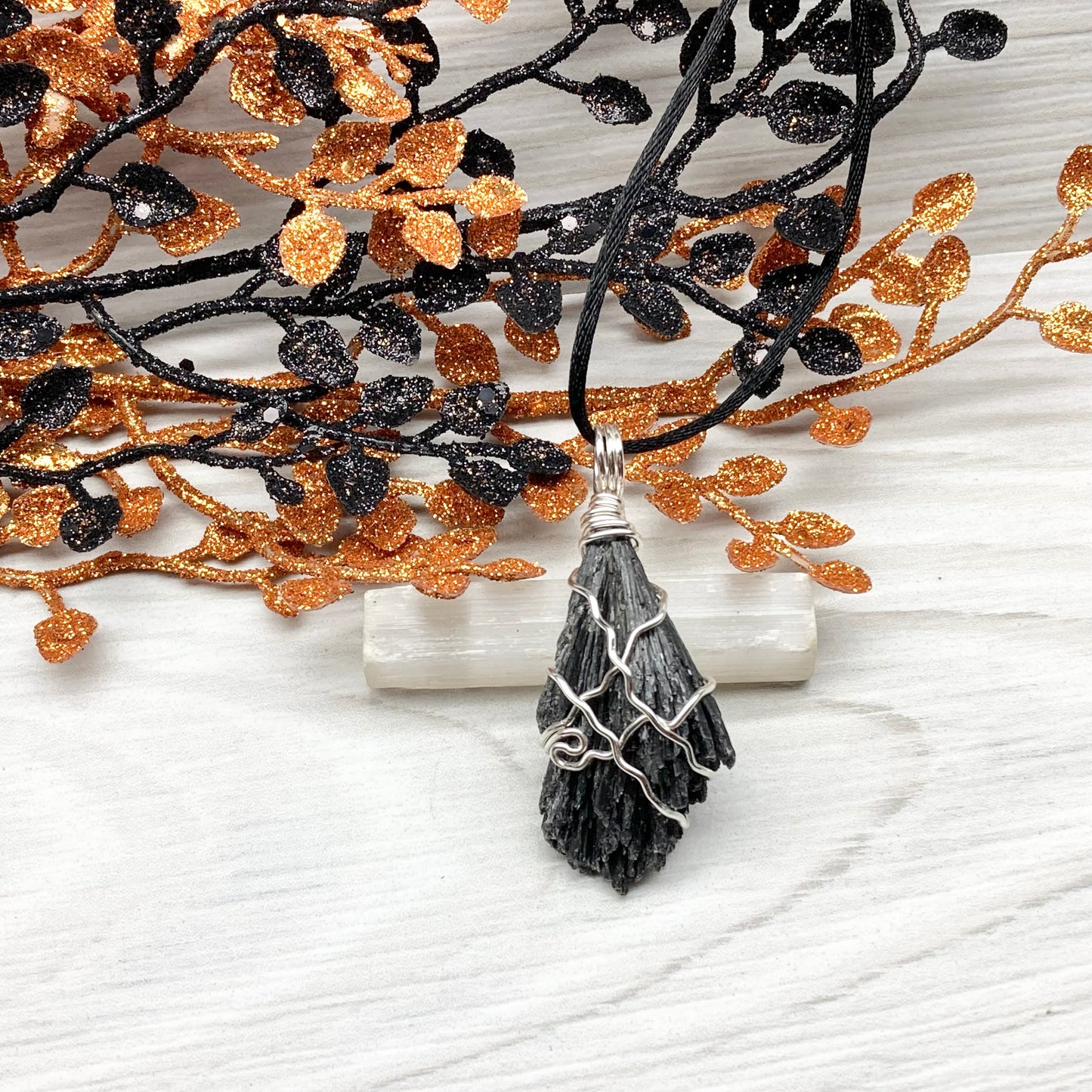 Black Kyanite necklace. Raw natural Kyanite wrapped with silver copper wire. Kyanite broom pendant. Black crystal jewelry. Comes on a black chain. Witchy gift.