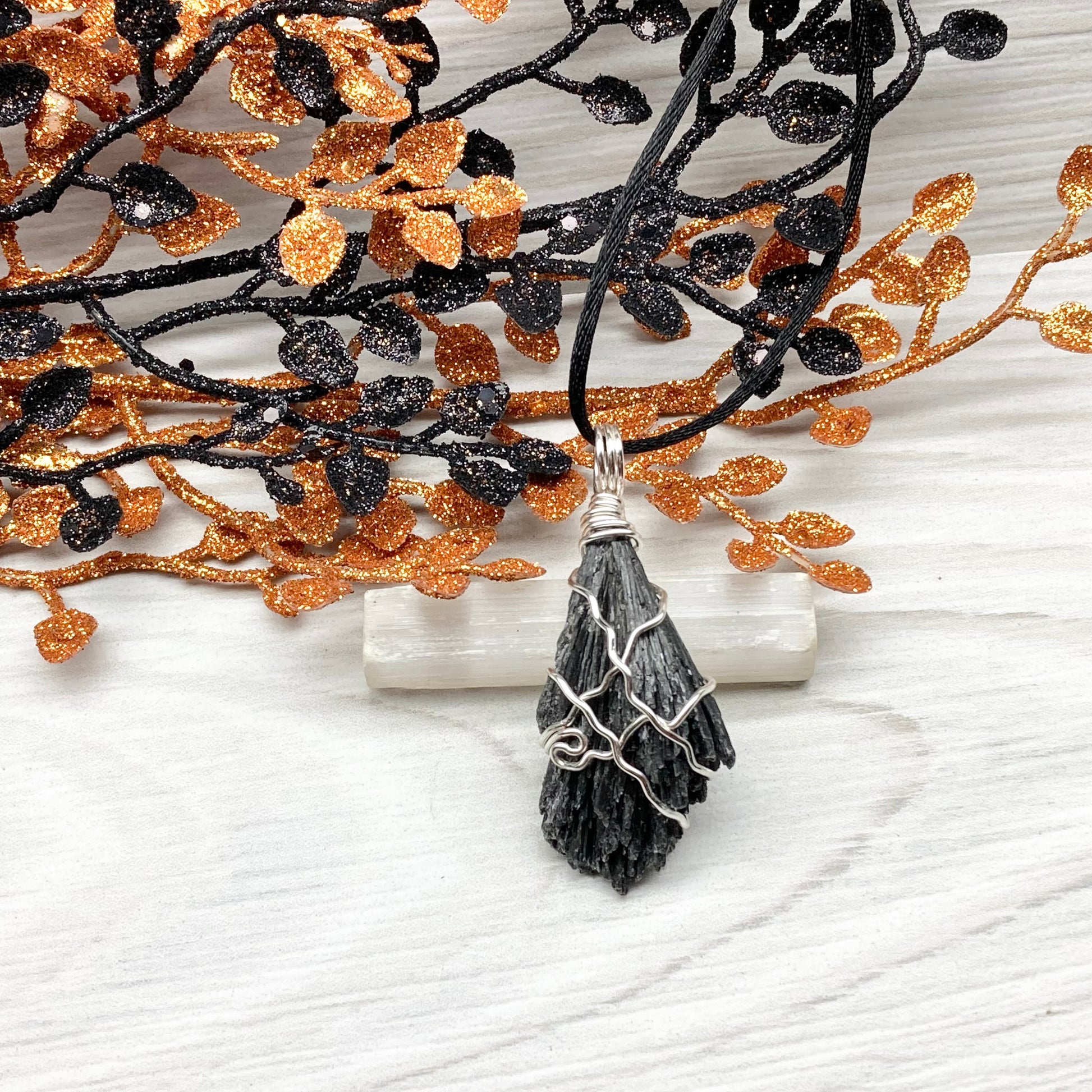 Black Kyanite necklace. Raw natural Kyanite wrapped with silver copper wire. Kyanite broom pendant. Black crystal jewelry. Comes on a black chain. Witchy gift.
