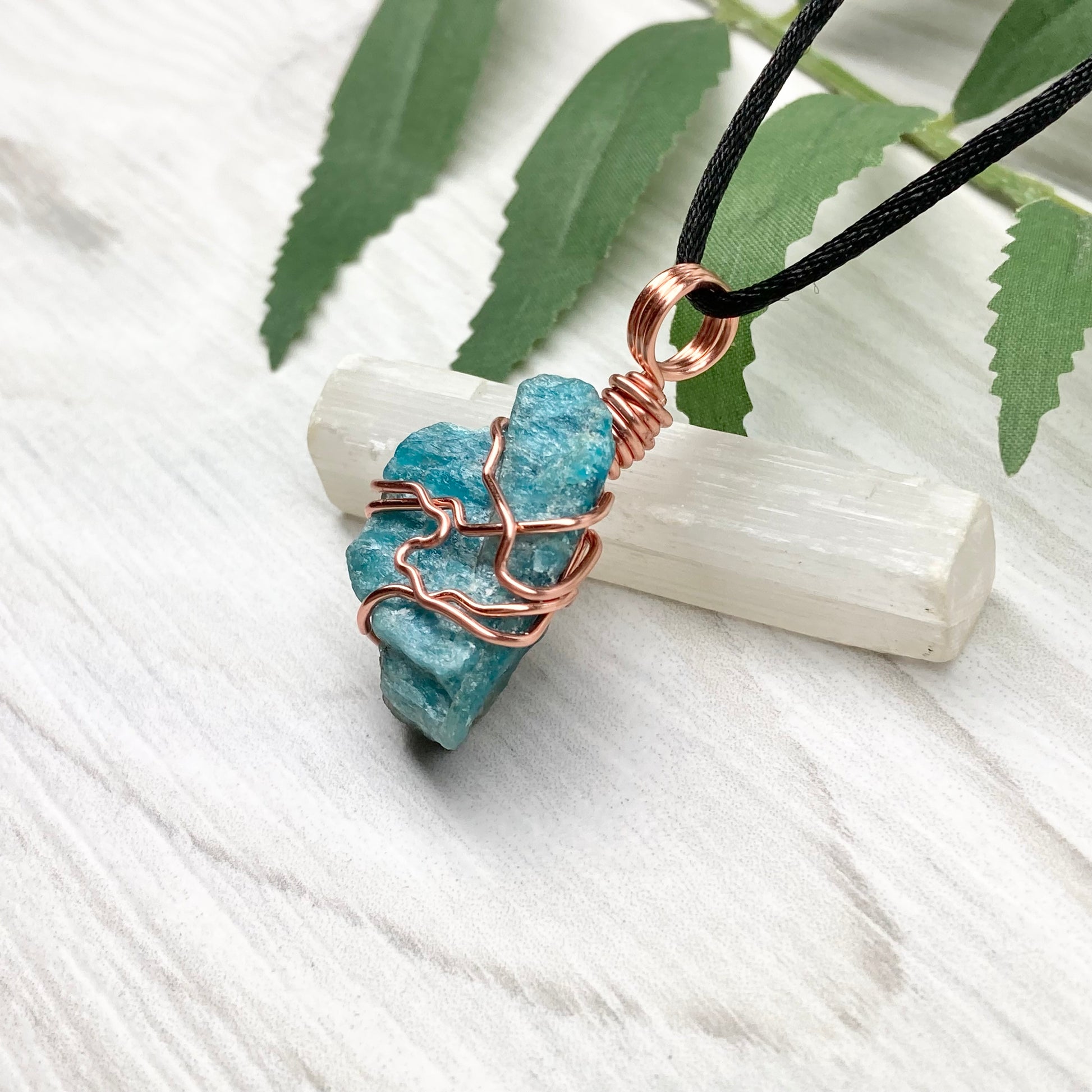 Blue Apatite Necklace. Raw Blue Apatite Stone Wrapped With Tarnish Resistant Copper Wire. This Pendant Was Handcrafted During The Moon In Scorpio. Comes On A Black Chain. Spiritual Jewelry For Him Or Her.