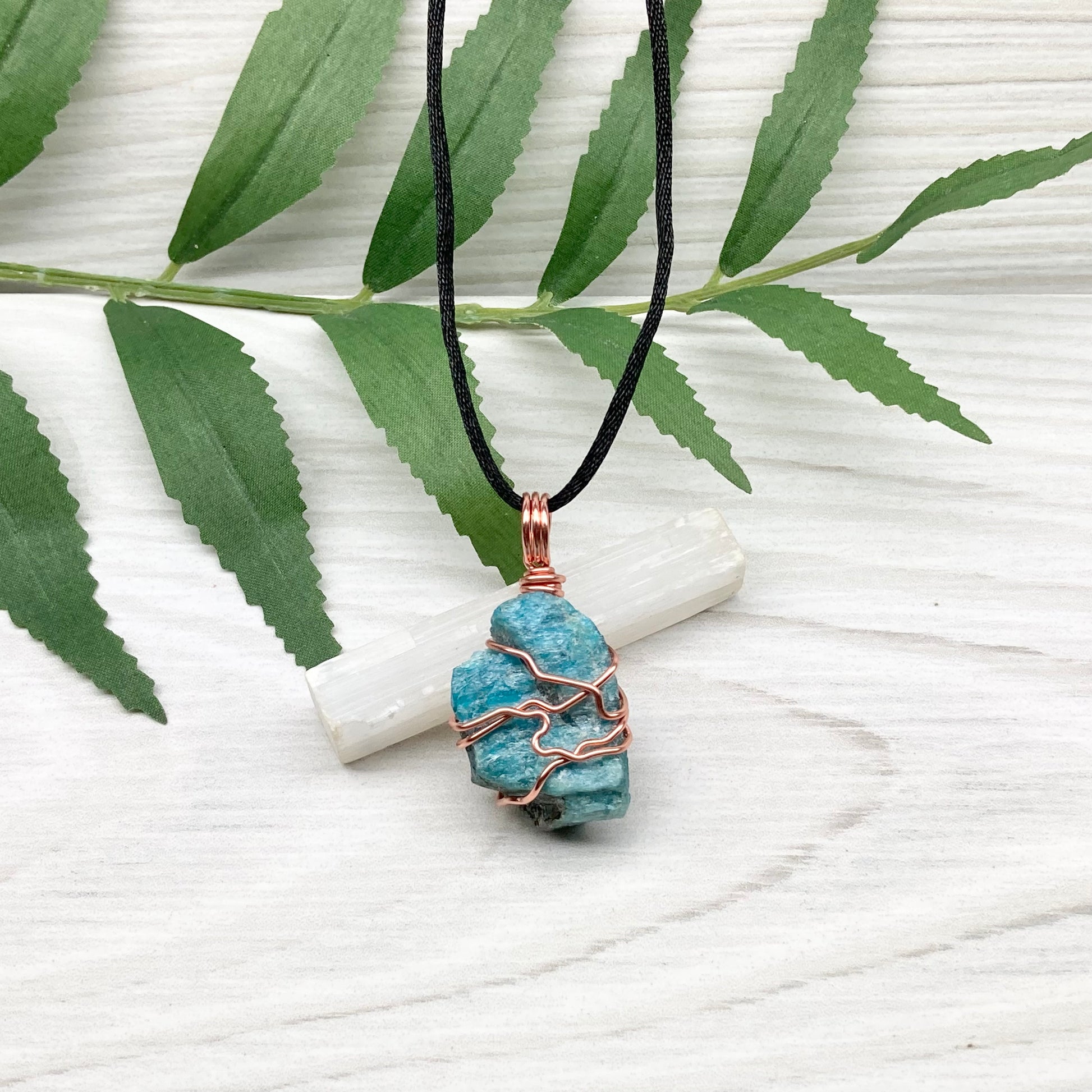 Blue Apatite Necklace. Raw Blue Apatite Stone Wrapped With Tarnish Resistant Copper Wire. This Pendant Was Handcrafted During The Moon In Scorpio. Comes On A Black Chain. Spiritual Jewelry For Him Or Her.