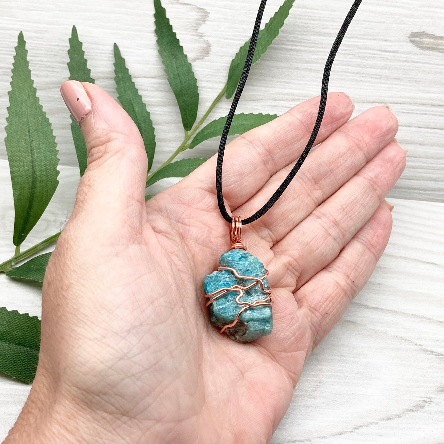 Blue Apatite Necklace. Raw Blue Apatite Stone Wrapped With Tarnish Resistant Copper Wire. This Pendant Was Handcrafted During The Moon In Scorpio. Comes On A Black Chain. Spiritual Jewelry For Him Or Her.