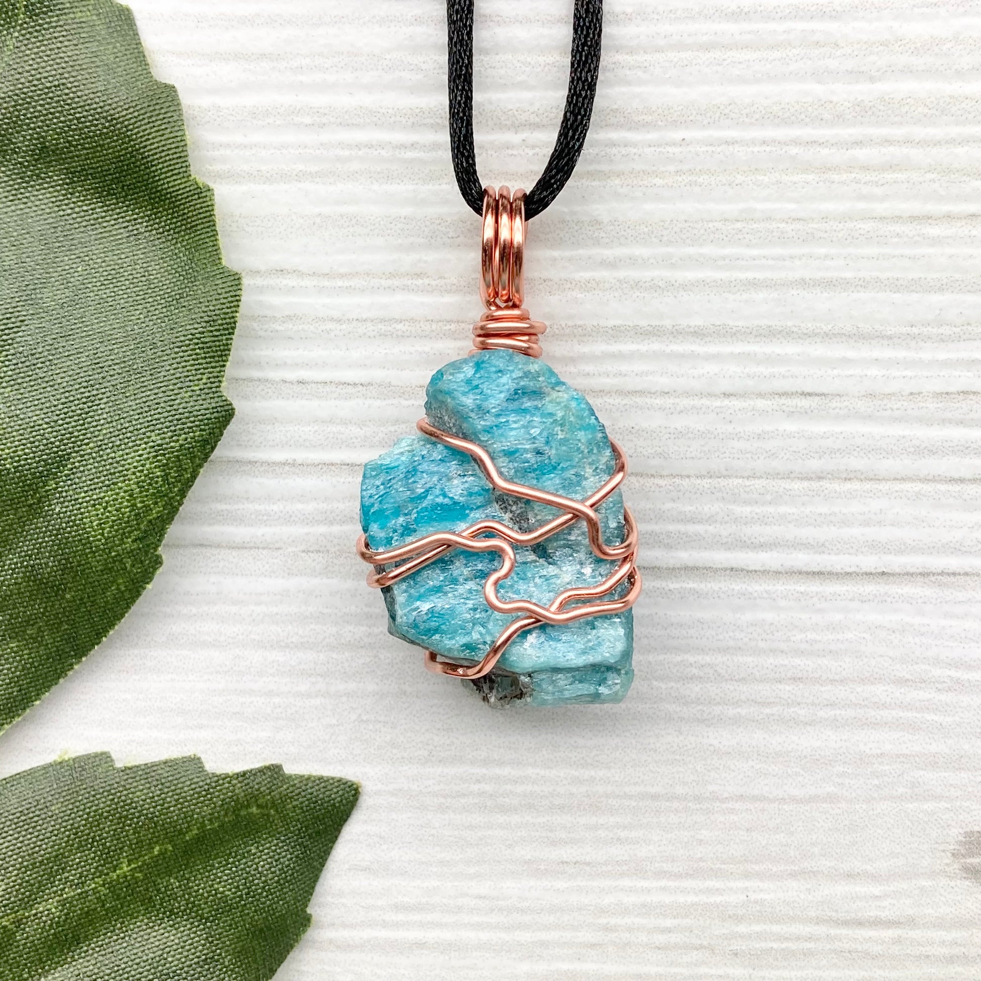 Blue Apatite Necklace. Raw Blue Apatite Stone Wrapped With Tarnish Resistant Copper Wire. This Pendant Was Handcrafted During The Moon In Scorpio. Comes On A Black Chain. Spiritual Jewelry For Him Or Her.
