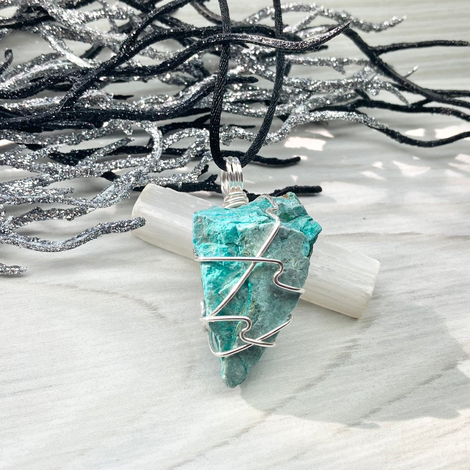 Chrysocolla Necklace. Raw Chrysocolla Crystal Wrapped With Silver Colored Copper Wire. This Stone Is A Beautiful Teal Color. Comes On A Black Chain.