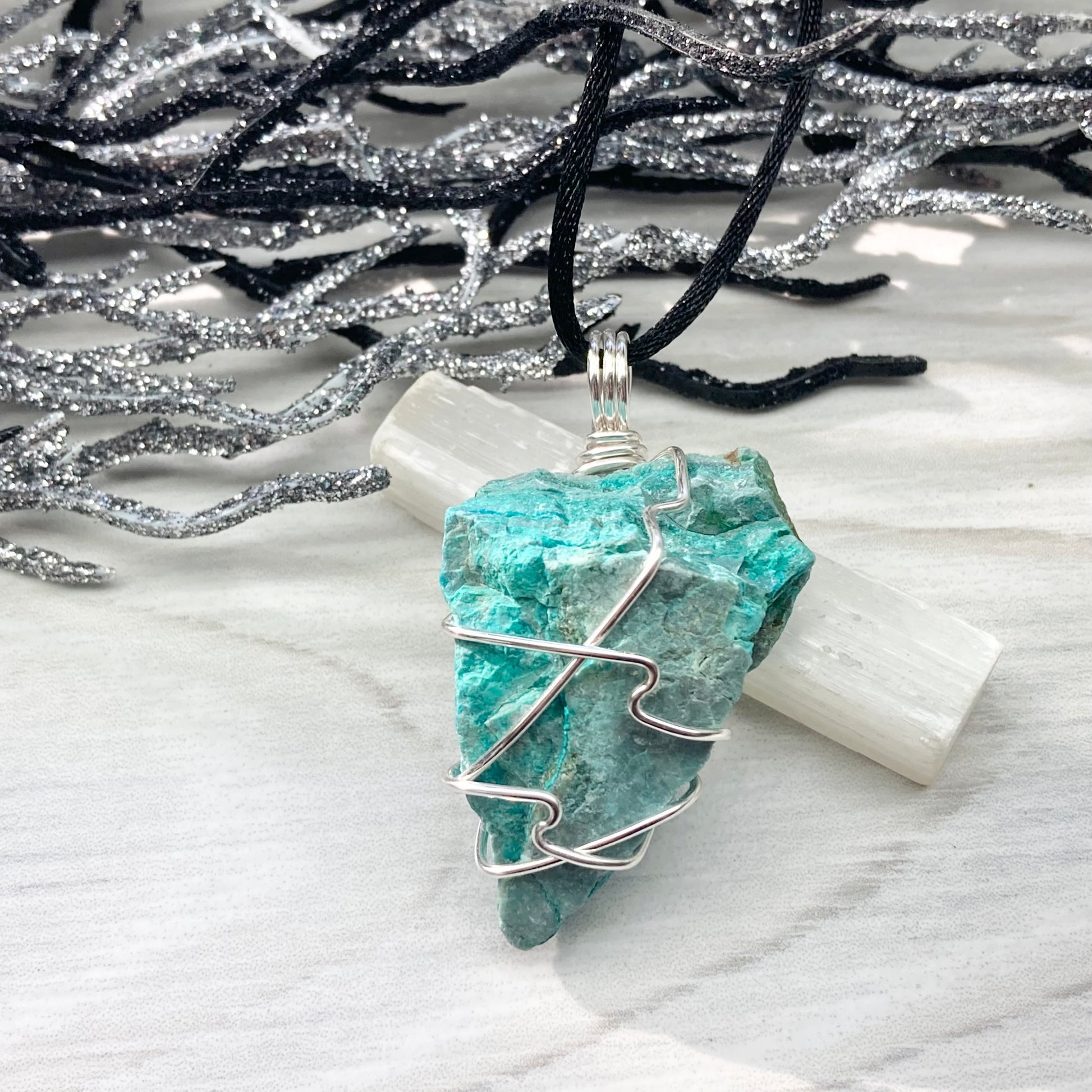 Chrysocolla Necklace. Raw Chrysocolla Crystal Wrapped With Silver Colored Copper Wire. This Stone Is A Beautiful Teal Color. Comes On A Black Chain.