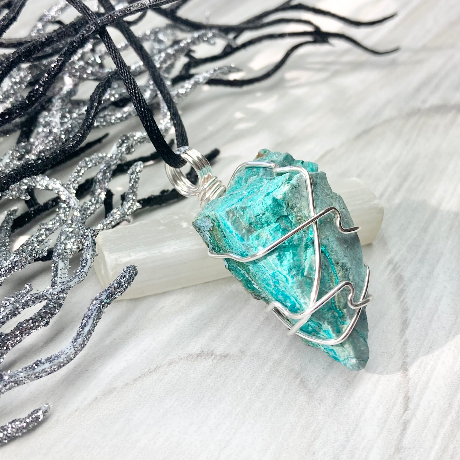 Chrysocolla Necklace. Raw Chrysocolla Crystal Wrapped With Silver Colored Copper Wire. This Stone Is A Beautiful Teal Color. Comes On A Black Chain.