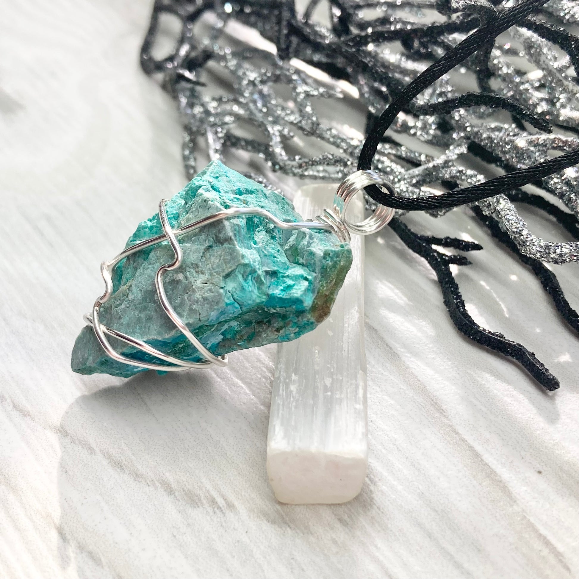 Chrysocolla Necklace. Raw Chrysocolla Crystal Wrapped With Silver Colored Copper Wire. This Stone Is A Beautiful Teal Color. Comes On A Black Chain.