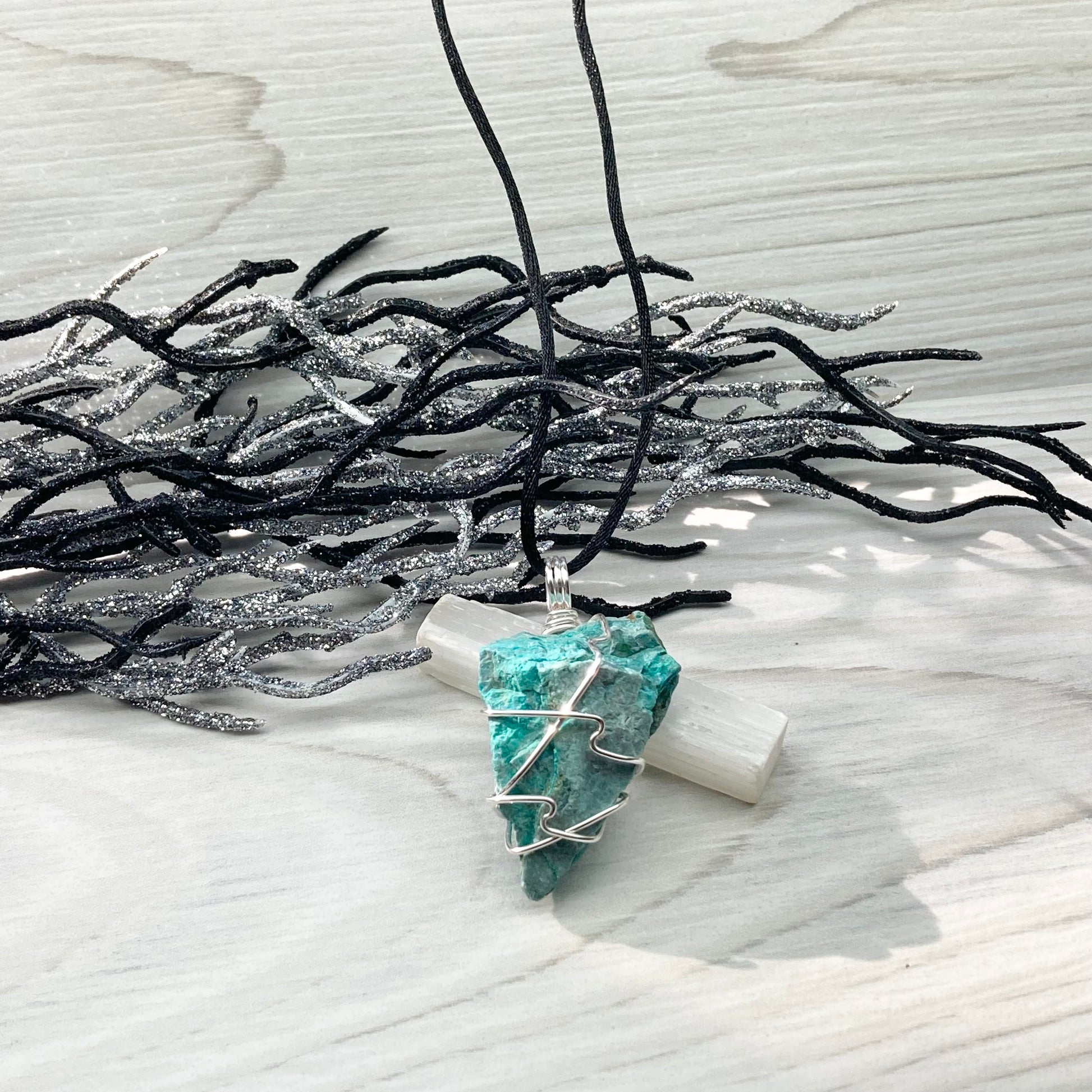 Chrysocolla Necklace. Raw Chrysocolla Crystal Wrapped With Silver Colored Copper Wire. This Stone Is A Beautiful Teal Color. Comes On A Black Chain.