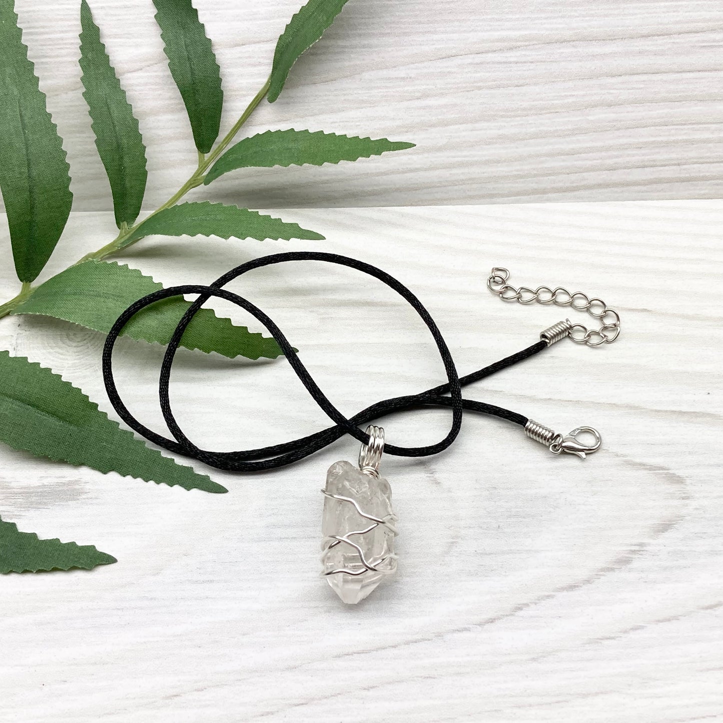 Natural Clear Quartz Necklace. Raw Quartz Wrapped With Silver Copper Wire. Comes On A Black Necklace. 