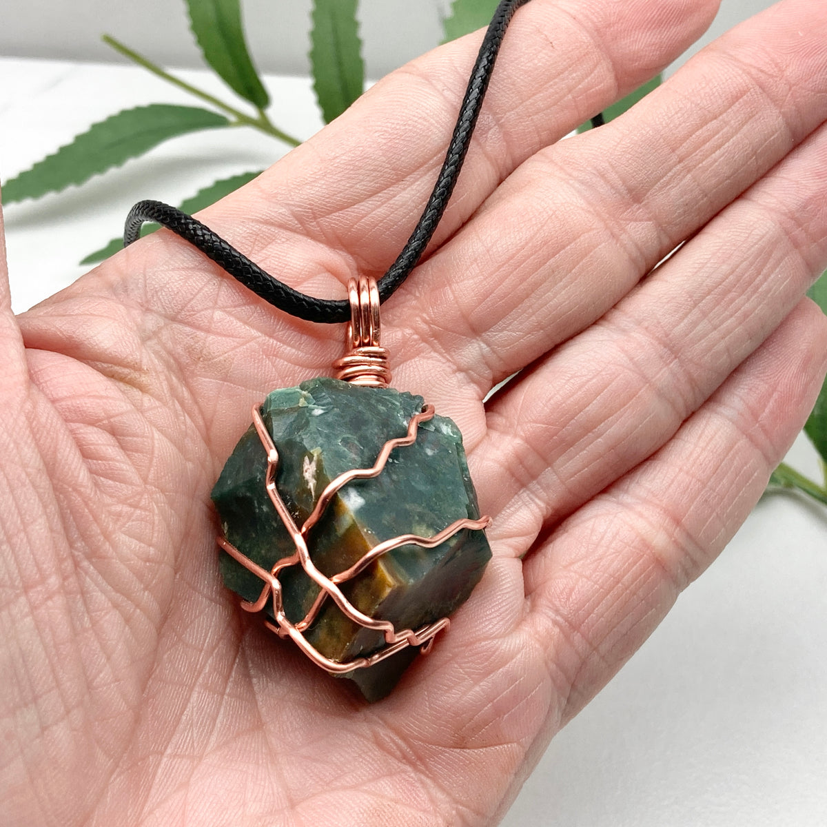 Chunky Green Jasper Necklace. Raw green stone wrapped with pure copper wire. Hangs on a black chain. Handmade spiritual jewelry.