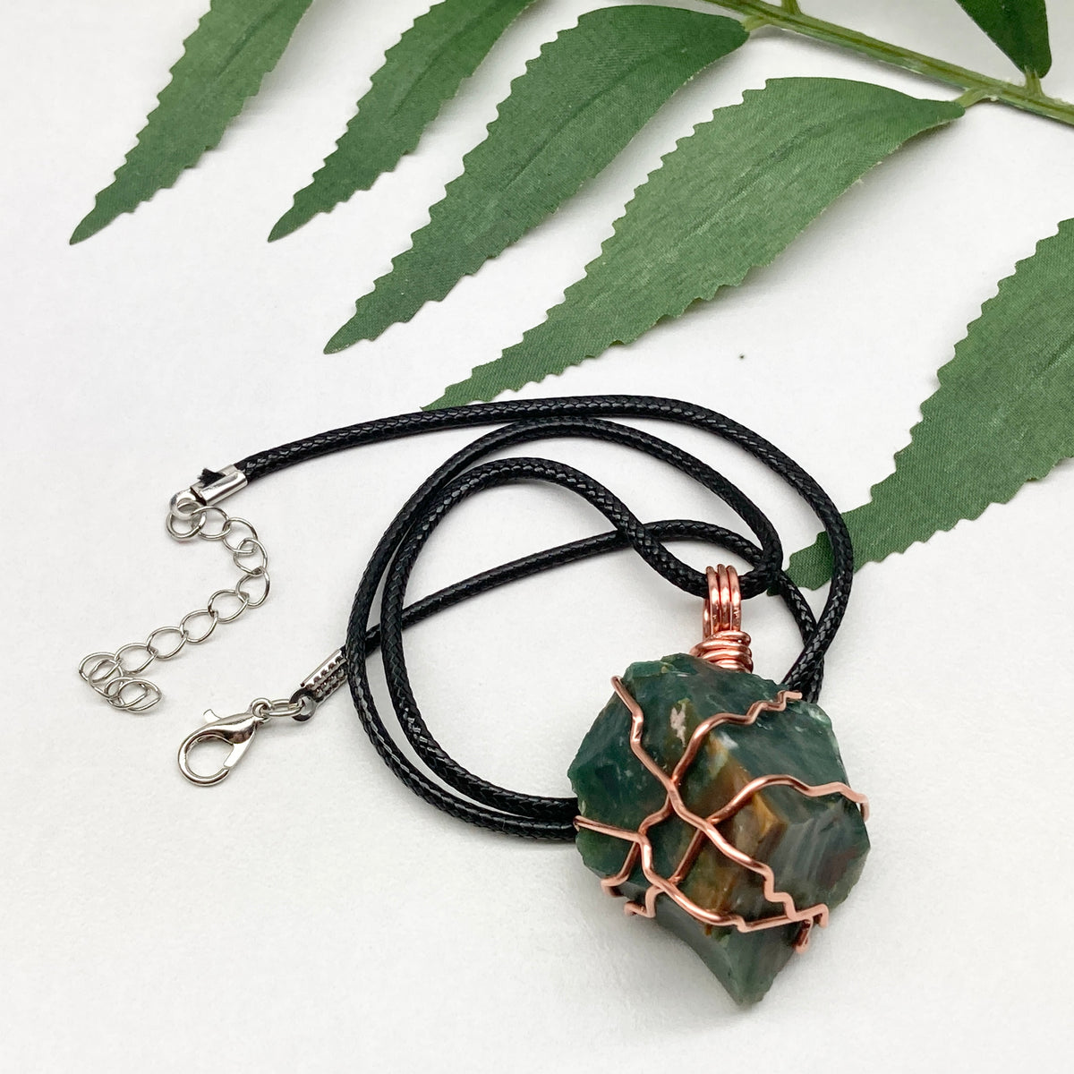 Chunky Green Jasper Necklace. Raw green stone wrapped with pure copper wire. Hangs on a black chain. Handmade spiritual jewelry.
