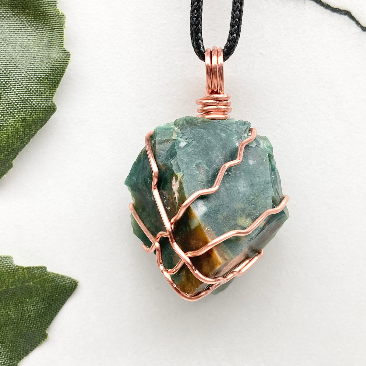 Chunky Green Jasper Necklace. Raw green stone wrapped with pure copper wire. Hangs on a black chain. Handmade spiritual jewelry.