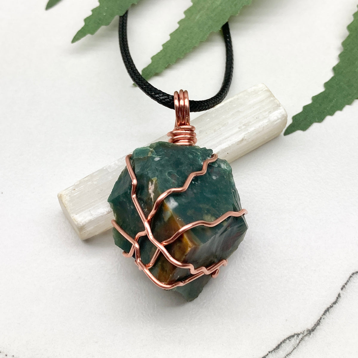 Chunky Green Jasper Necklace. Raw green stone wrapped with pure copper wire. Hangs on a black chain. Handmade spiritual jewelry.