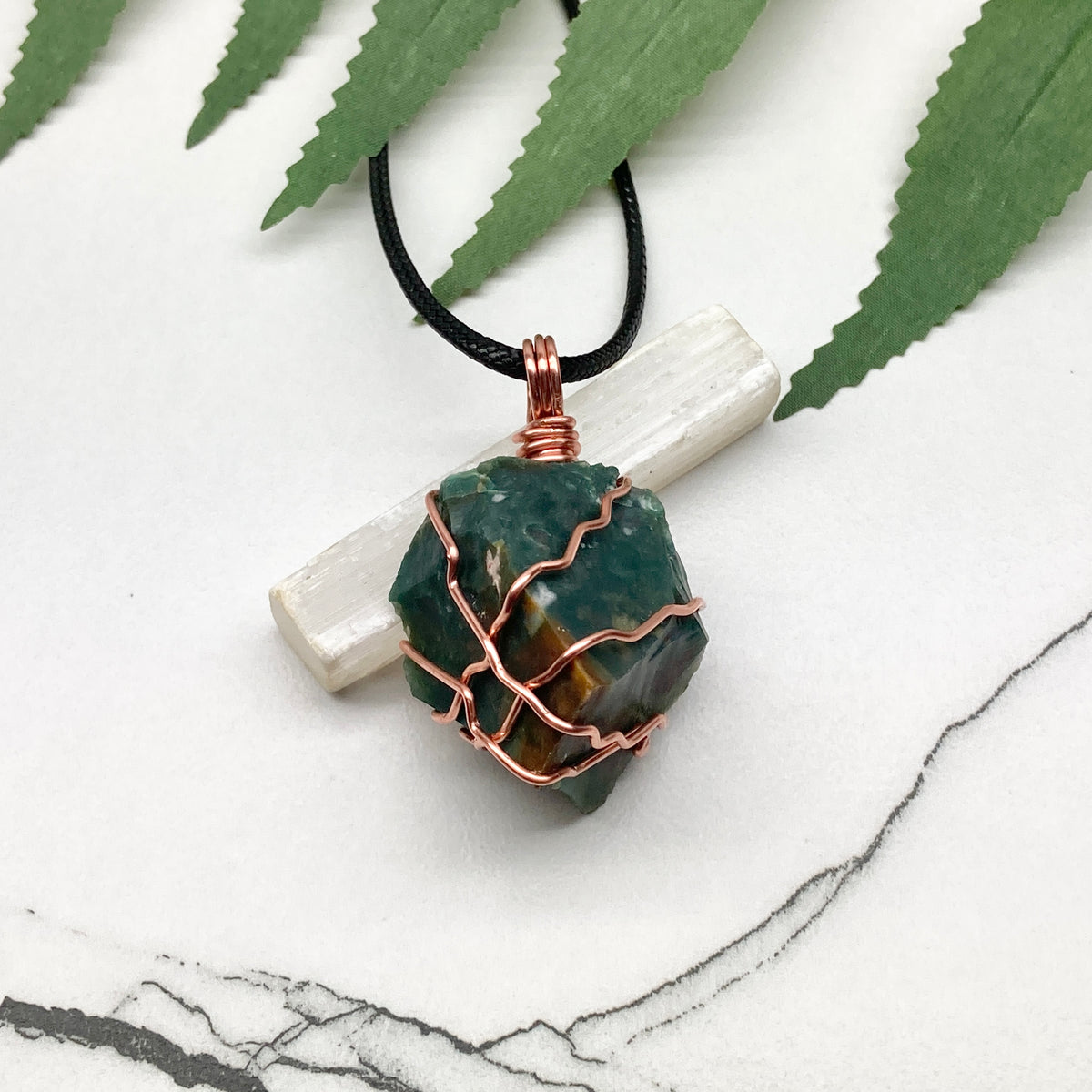 Chunky Green Jasper Necklace. Raw green stone wrapped with pure copper wire. Hangs on a black chain. Handmade spiritual jewelry.