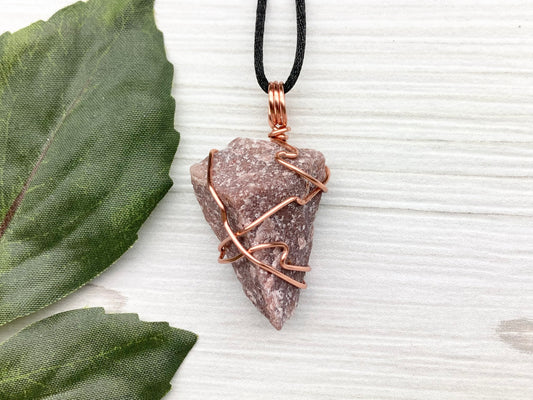 Natural Guava Quartz Necklace. This Crystal Is Hand Wrapped With Copper Wire. Stone is a Purple Brown Color. Comes On A Black Chain. Peace And Harmony Gemstone.