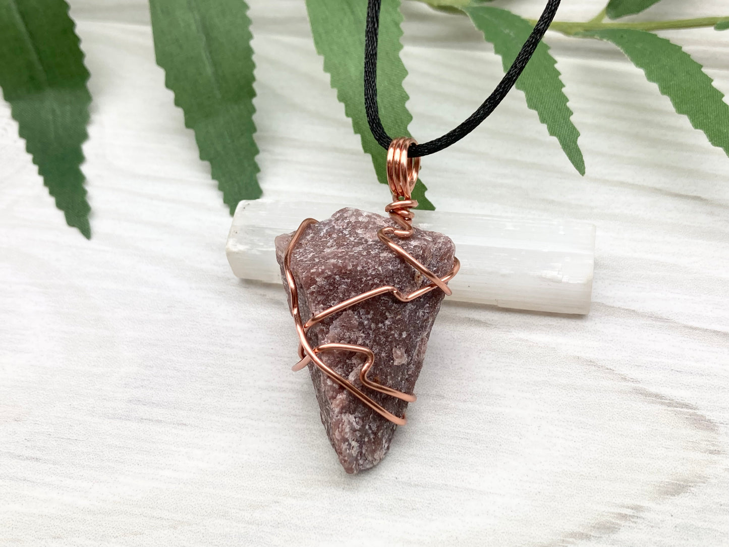 Natural Guava Quartz Necklace. This Crystal Is Hand Wrapped With Copper Wire. Stone is a Purple Brown Color. Comes On A Black Chain. Peace And Harmony Gemstone.